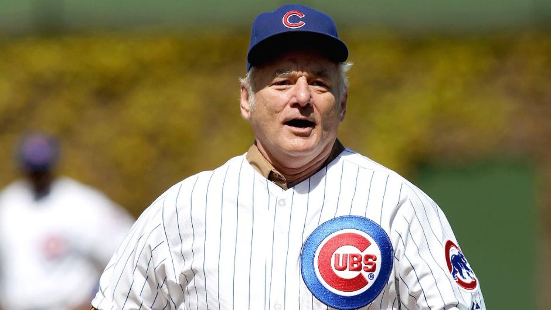 CHICAGO, IL - APRIL 05: Actor Bill Murray runs the bases before throwing out a ceremonial first pitch before the Chicago Cubs take on the Washington Nationals during the opening day game at Wrigley Field on April 5, 2012 in Chicago, Illinois. The Nationals defeated the Cubs 2-1. (Photo by Jonathan Daniel/Getty Images) *** Local Caption *** Bill Murray
