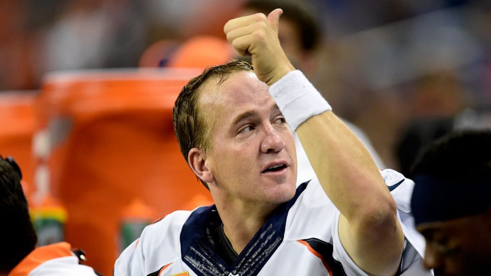 DETROIT, MI - SEPTEMBER 27: Peyton Manning (18) of the Denver Broncos smiles on the bench as the clock winds down late in the fourth against the Detroit Lions during the second half of the Broncos' 24-12 win at Ford Field. The Detroit Lions hosted the Denver Broncos in NFL week 3 action on Sunday, September 27, 2015. (Photo by AAron Ontiveroz/The Denver Post via Getty Images)