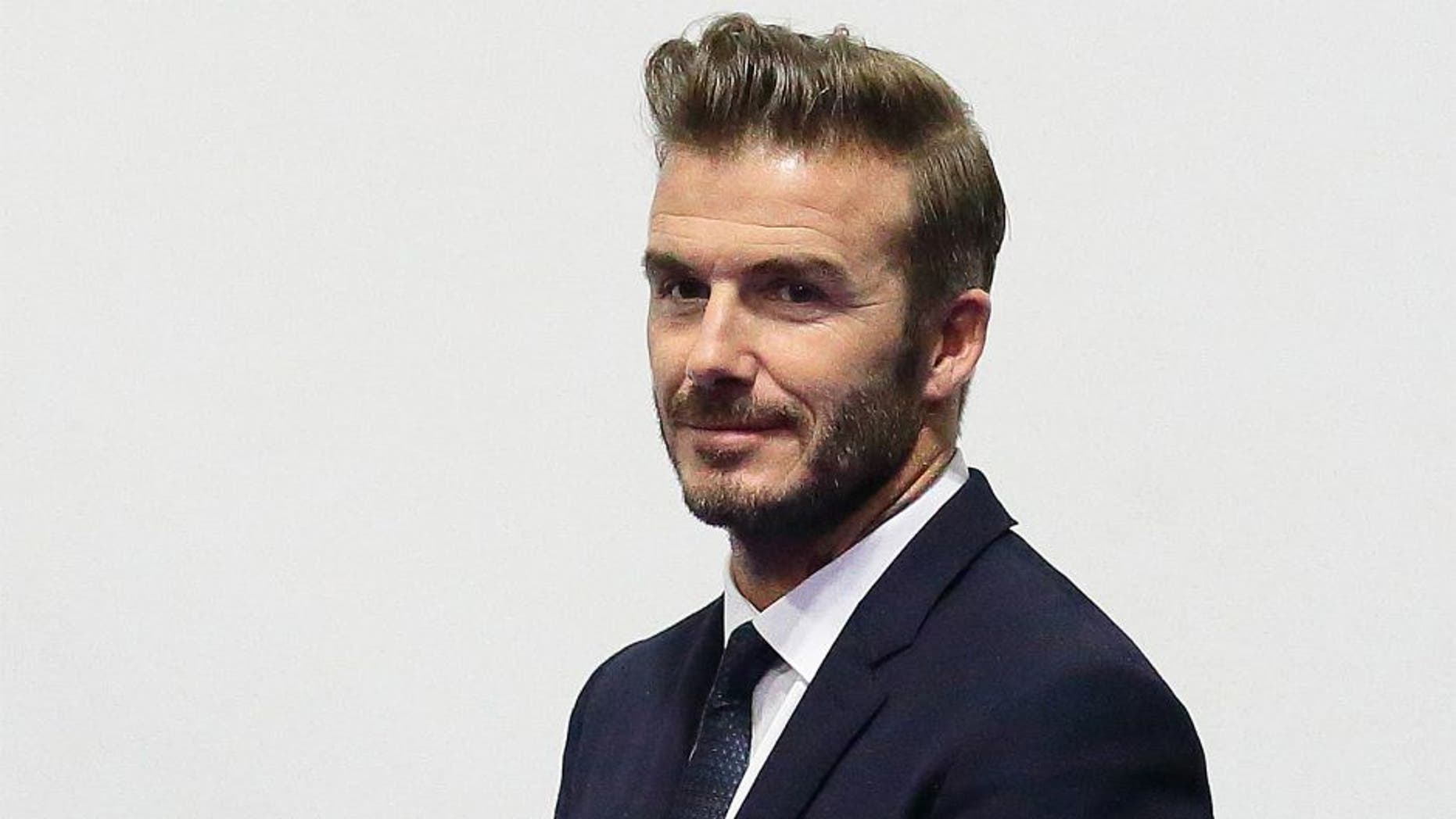 SINGAPORE - DECEMBER 06: English former professional footballer, David Beckham arrives at the Men's Team Football 5-a-Side match between Singapore and Thailand during the 8th ASEAN Para Games 2015 at the Marina Bay Sands Hall on December 6, 2015 in Singapore. (Photo by Suhaimi Abdullah/Getty Images)