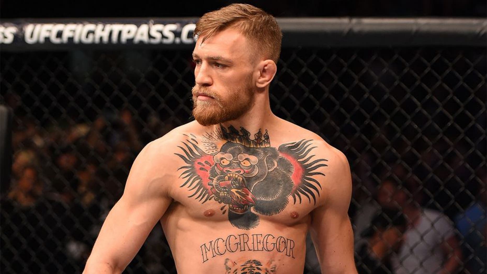 LAS VEGAS, NV - DECEMBER 12: Conor McGregor of Ireland enters the Octagon before his UFC welterweight championship bout against Jose Aldo during the UFC 194 event inside MGM Grand Garden Arena on December 12, 2015 in Las Vegas, Nevada. (Photo by Josh Hedges/Zuffa LLC/Zuffa LLC via Getty Images)