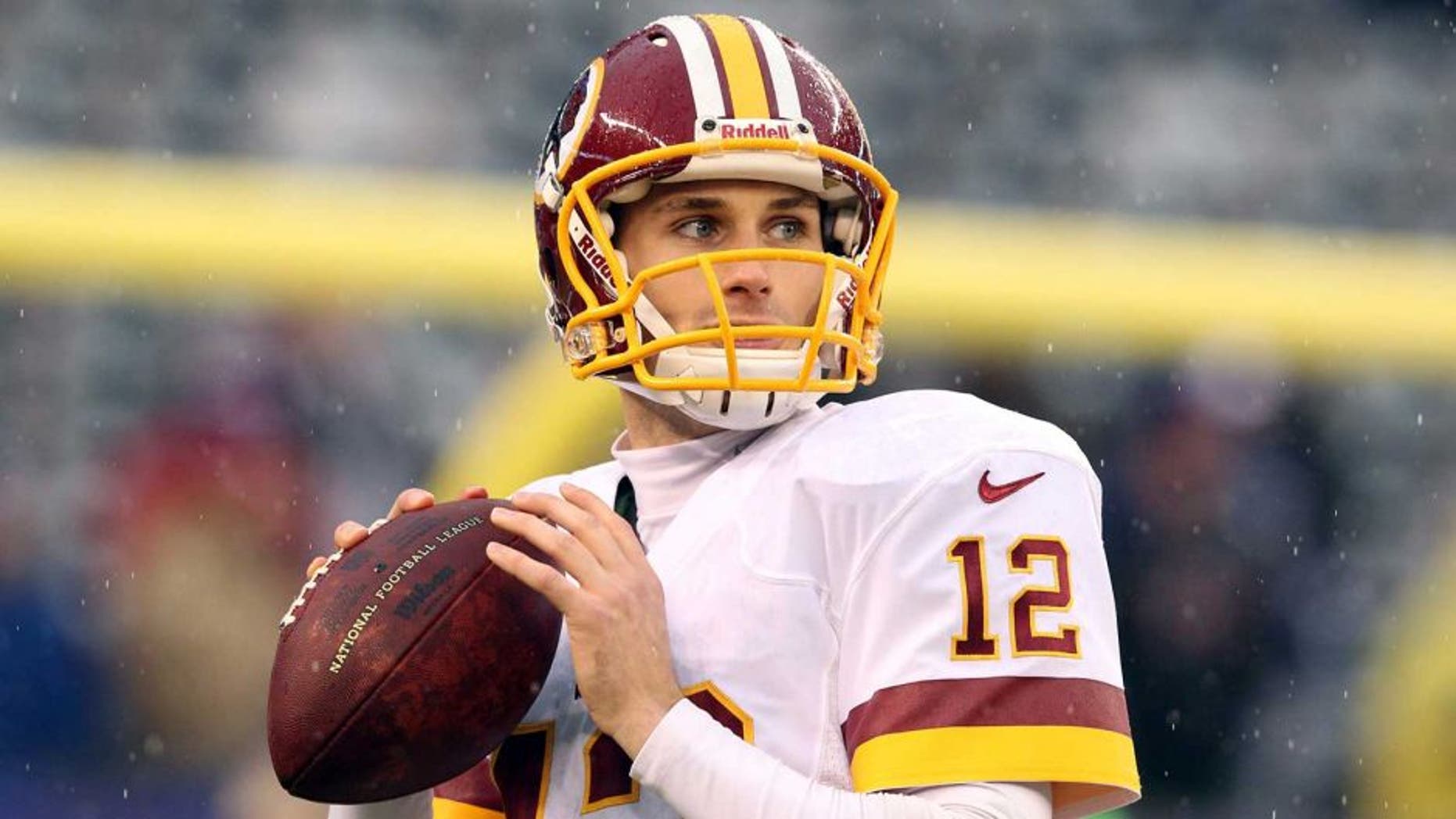 Dec 29, 2013; East Rutherford, NJ, USA; Washington Redskins quarterback Kirk Cousins (12) warms up before a game against the New York Giants at MetLife Stadium. Mandatory Credit: Brad Penner-USA TODAY Sports