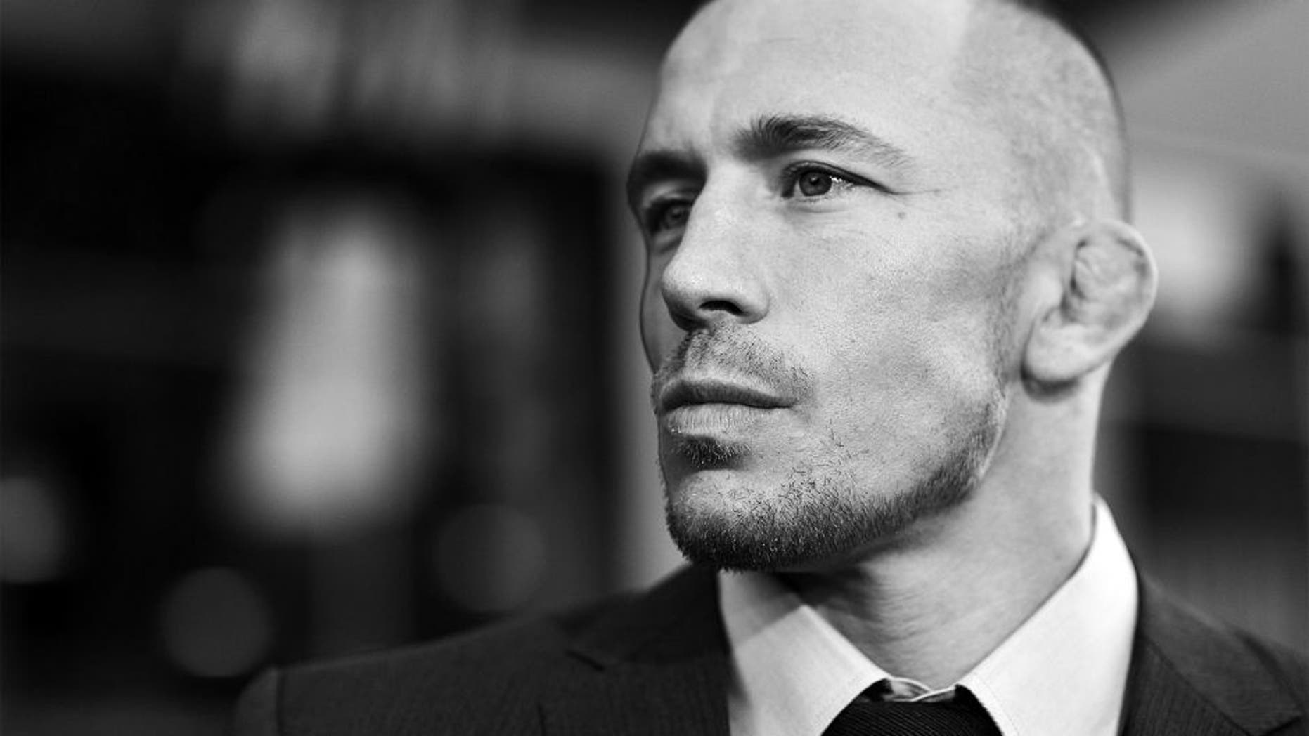 HOLLYWOOD, CA - MARCH 13: (EDITORS NOTE: Image shot on black and white film. Color version not available.) Actor Georges St-Pierre attends Marvel's "Captain America: The Winter Soldier" premiere at the El Capitan Theatre on March 13, 2014 in Hollywood, California. (Photo by Charley Gallay/Getty Images for Disney)
