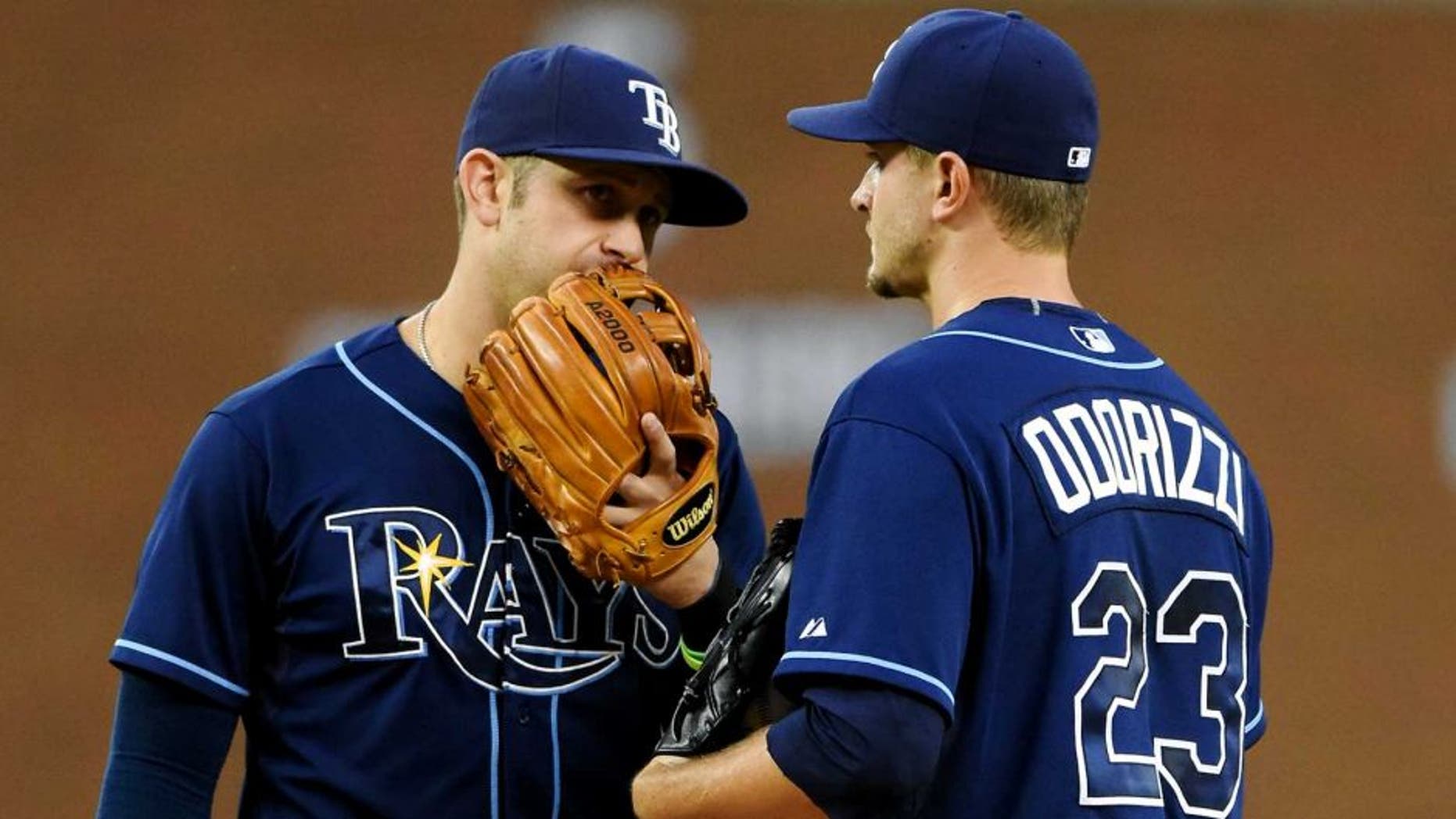 DETROIT, MI - SEPTEMBER 09: Evan Longoria #3 (L) and Jake Odorizzi #23 of the Tampa Bay Rays talk on the pitchers mound during the game against the Detroit Tigers at Comerica Park on September 9, 2015 in Detroit, Michigan. The Rays defeated the Tigers 8-0. (Photo by Mark Cunningham/MLB Photos via Getty Images)