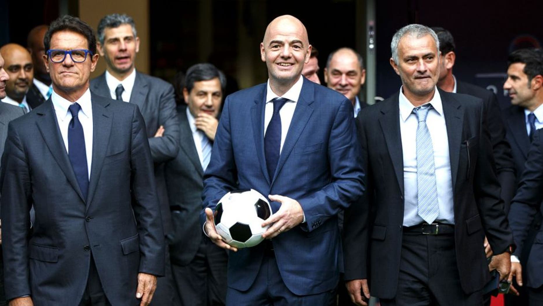 LONDON, UNITED KINGDOM - FEBRUARY 01: FIFA Presidential candidate Gianni Infantino (C) walks with Fabio Capello (L) and former Chelsea manager Jose Mourinho (R) after Gianni Infantino's press conference at Wembley Stadium on February 1, 2016 in London, United Kingdom. Gianni Infantino unveils his 90 day plan that he will implement if he is elected as FIFA President. (Photo by Tolga Akmen/Anadolu Agency/Getty Images)