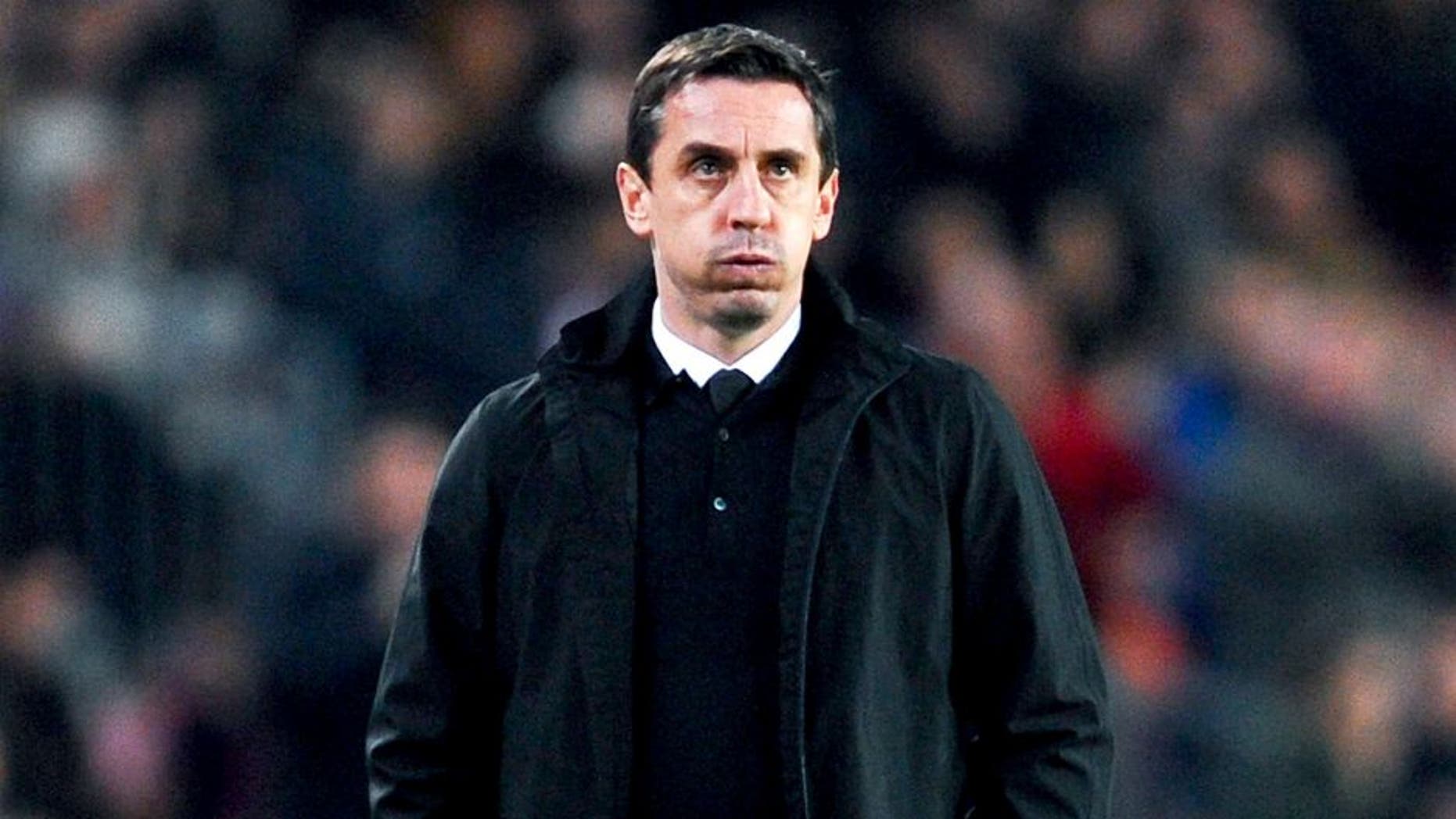 BARCELONA, SPAIN - FEBRUARY 03: Head coach Gary Neville of Valencia CF reacts during the Copa del Rey Semi Final first leg match between FC Barcelona and Valencia at Nou Camp on February 3, 2016 in Barcelona, Spain. (Photo by David Ramos/Getty Images)