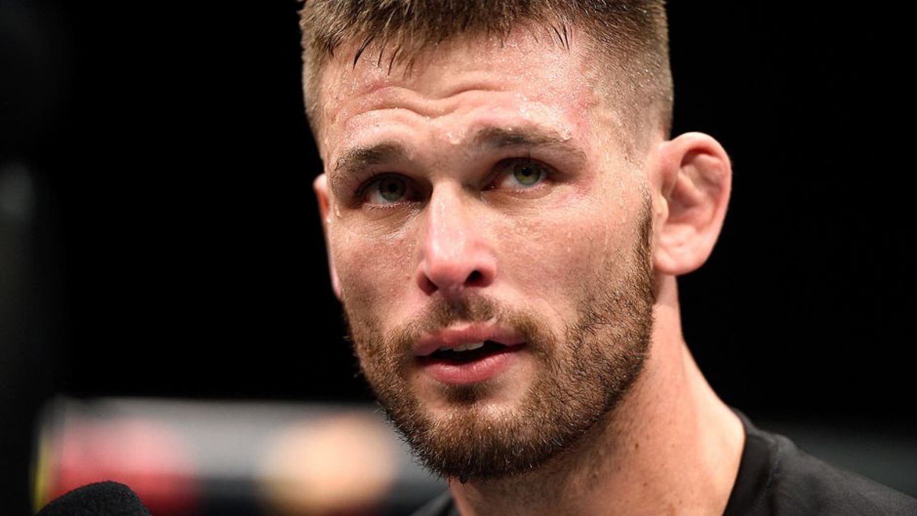LAS VEGAS, NEVADA - DECEMBER 10: Tim Means celebrates his win over John Howard in their welterweight bout during the UFC Fight Night event at The Chelsea at the Cosmopolitan of Las Vegas on December 10, 2015 in Las Vegas, Nevada. (Photo by Jeff Bottari/Zuffa LLC/Zuffa LLC via Getty Images)