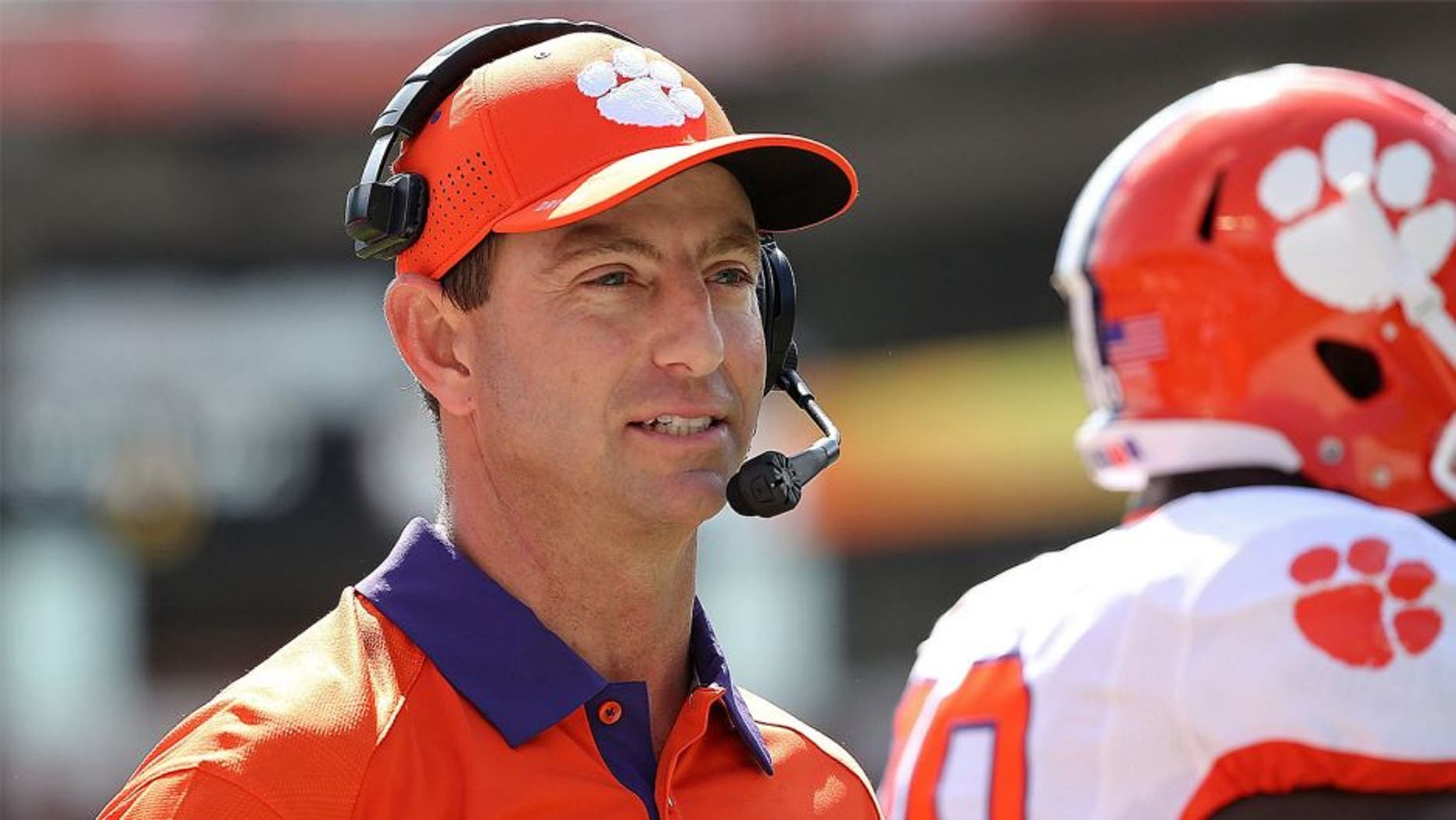 MIAMI GARDENS, FL - OCTOBER 24: Head coach Dabo Swinney of the Clemson Tigers reacts to a play during a game against the Miami Hurricanes at Sun Life Stadium on October 24, 2015 in Miami Gardens, Florida. (Photo by Mike Ehrmann/Getty Images)