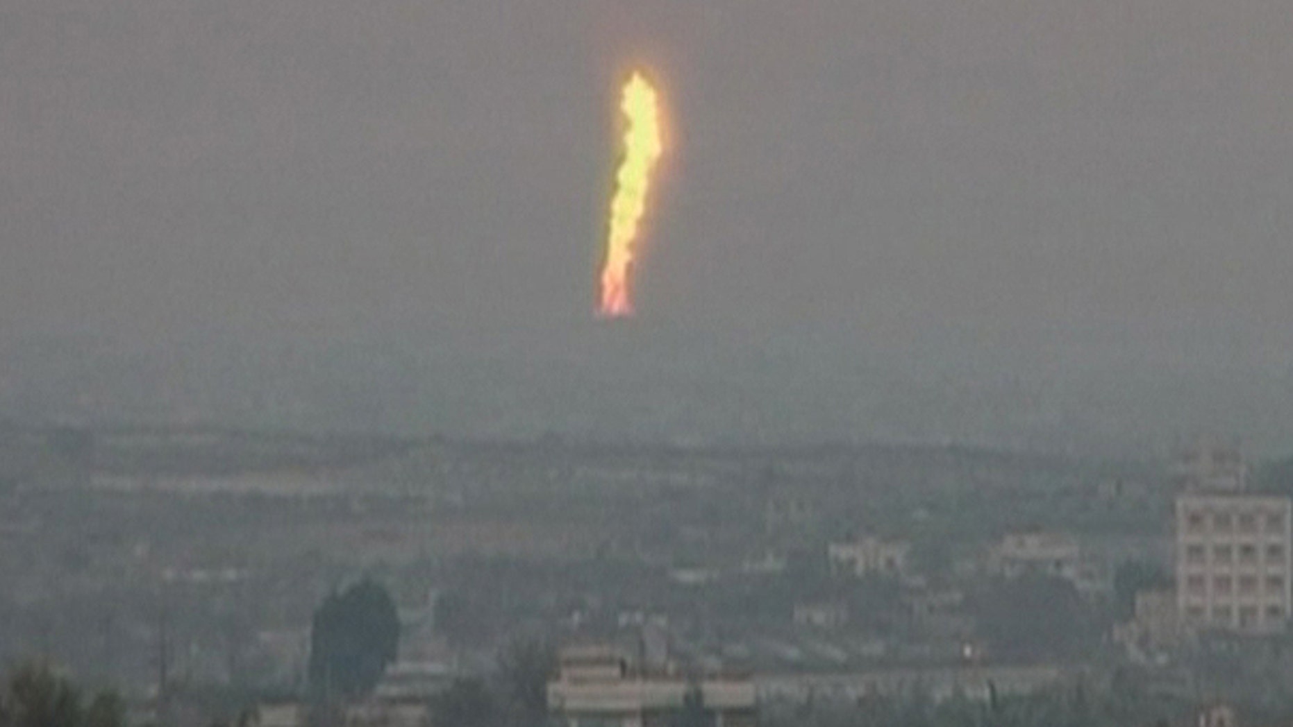 Feb. 5: In this image taken from Associated Press Television News video, a fire is seen after an explosion went off at a gas terminal in Egypt's northern Sinai Peninsula, setting off a massive fire along a gas pipeline that could be seen dozens of miles away, officials and witnesses said.
