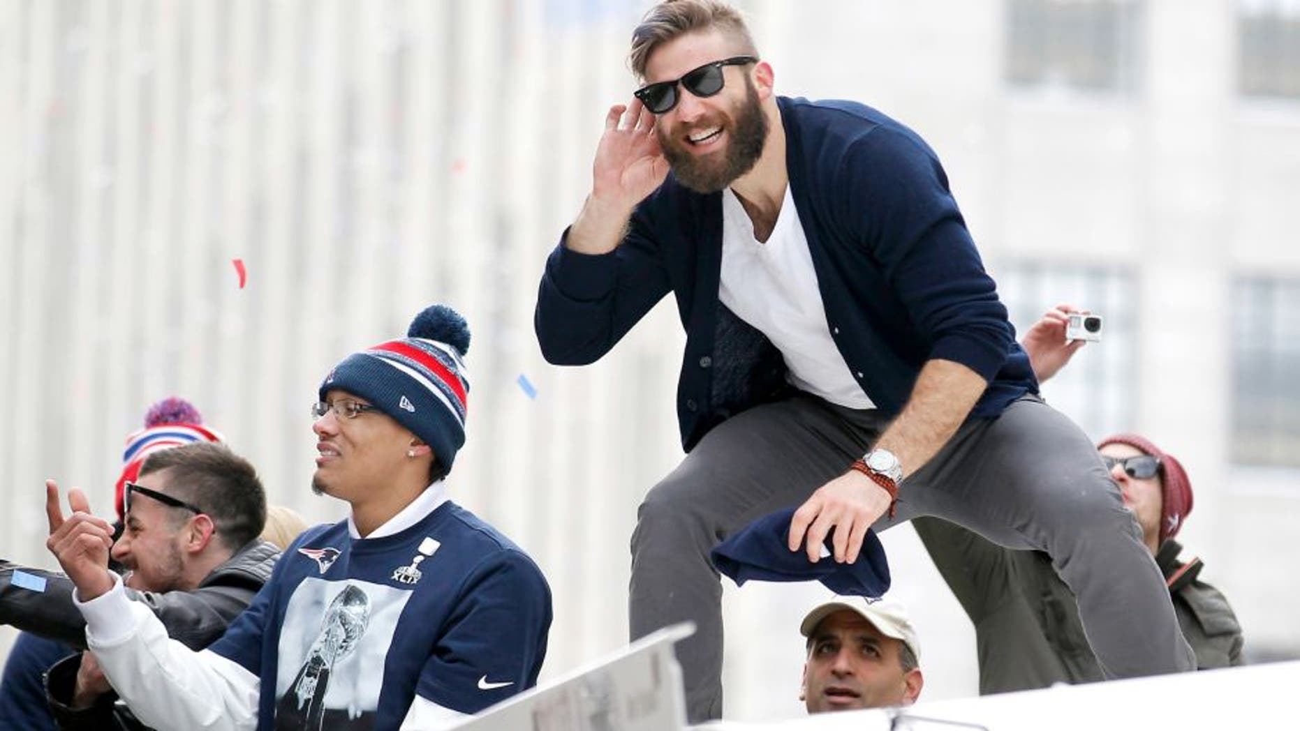 Feb 4, 2015; Boston, MA, USA; New England Patriots wide receiver Julian Edelman gestures to the fans during the Super Bowl XLIX victory parade. Mandatory Credit: Stew Milne-USA TODAY Sports