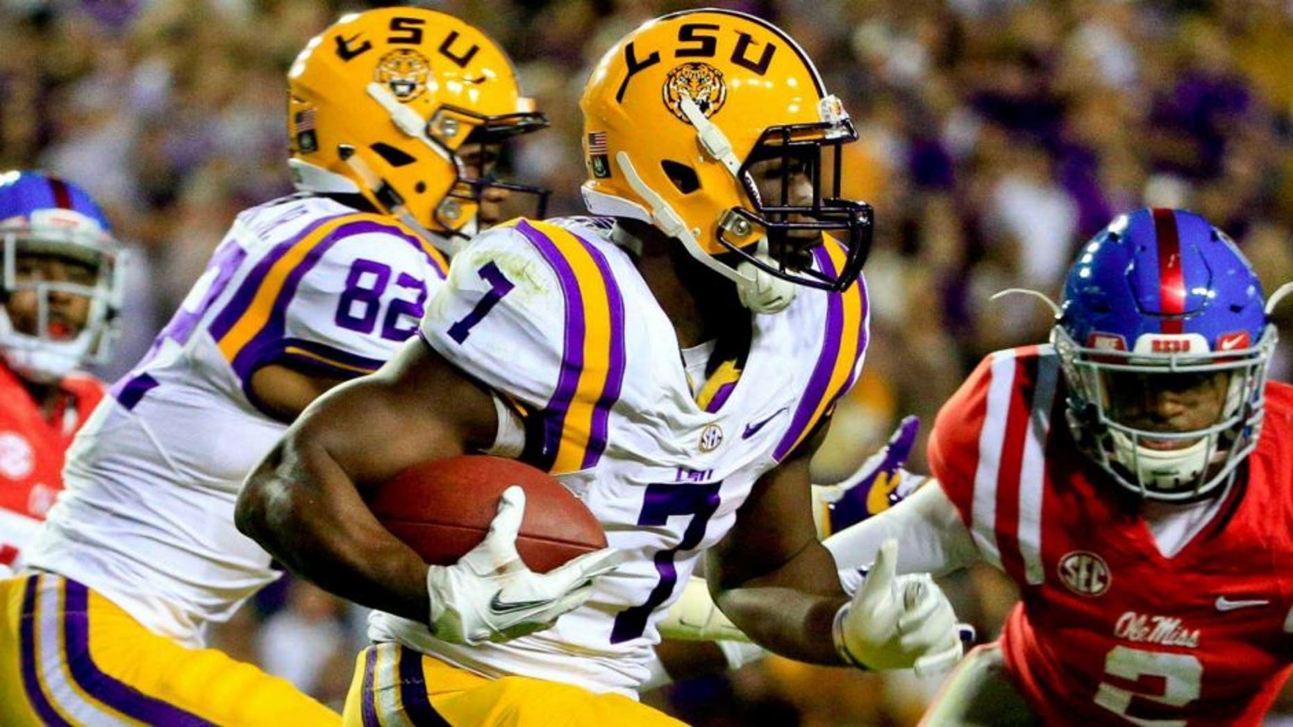 Oct 22, 2016; Baton Rouge, LA, USA; LSU Tigers running back Leonard Fournette (7) runs for a touchdown against the Mississippi Rebels during the second quarter of a game at Tiger Stadium. Mandatory Credit: Derick E. Hingle-USA TODAY Sports
