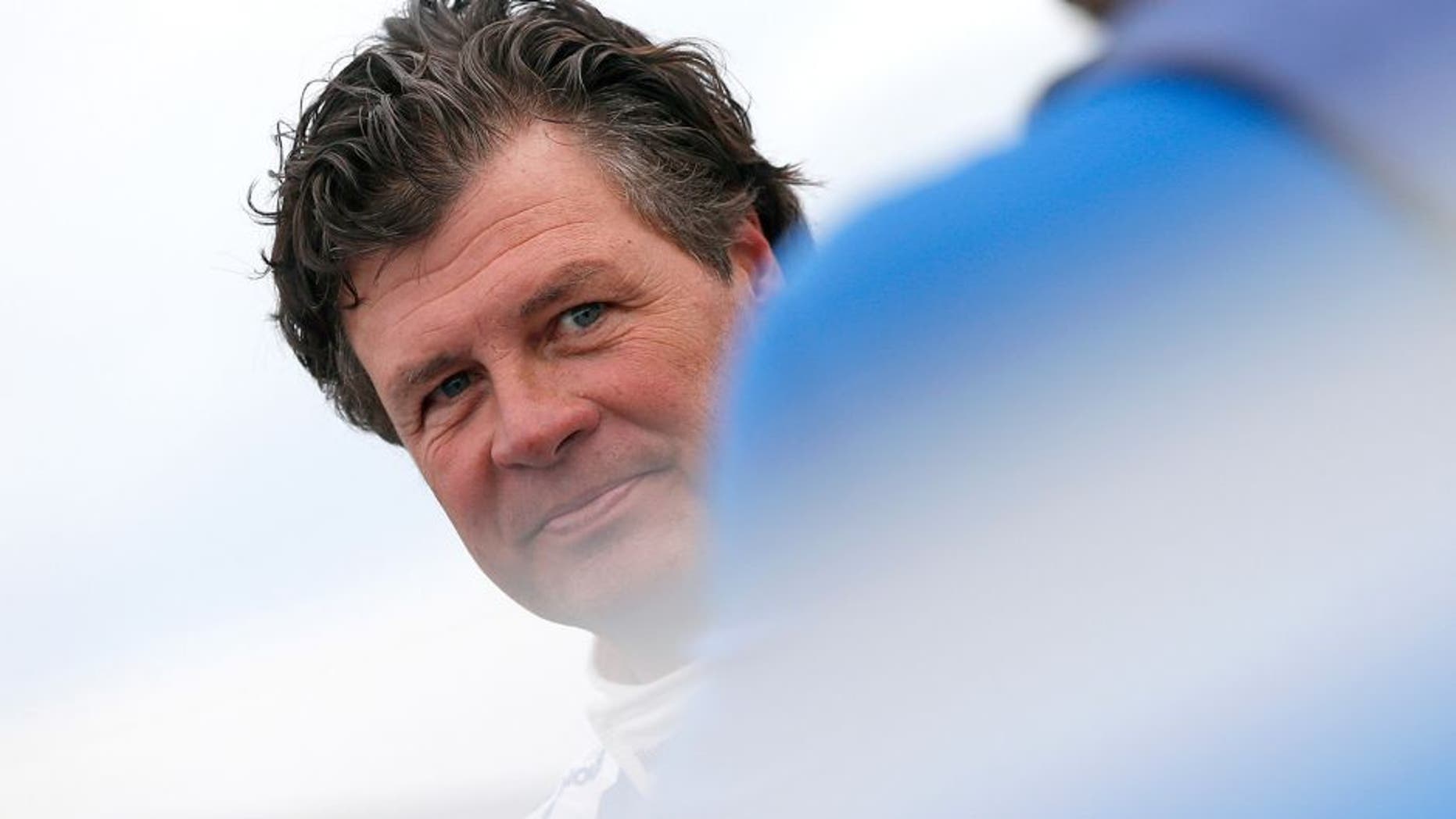 TALLADEGA, AL - OCTOBER 24: Michael Waltrip, driver of the #98 Maxwell House Toyota, stands on the grid during qualifying for the NASCAR Sprint Cup Series CampingWorld.com 500 at Talladega Superspeedway on October 24, 2015 in Talladega, Alabama. (Photo by Brian Lawdermilk/Getty Images)