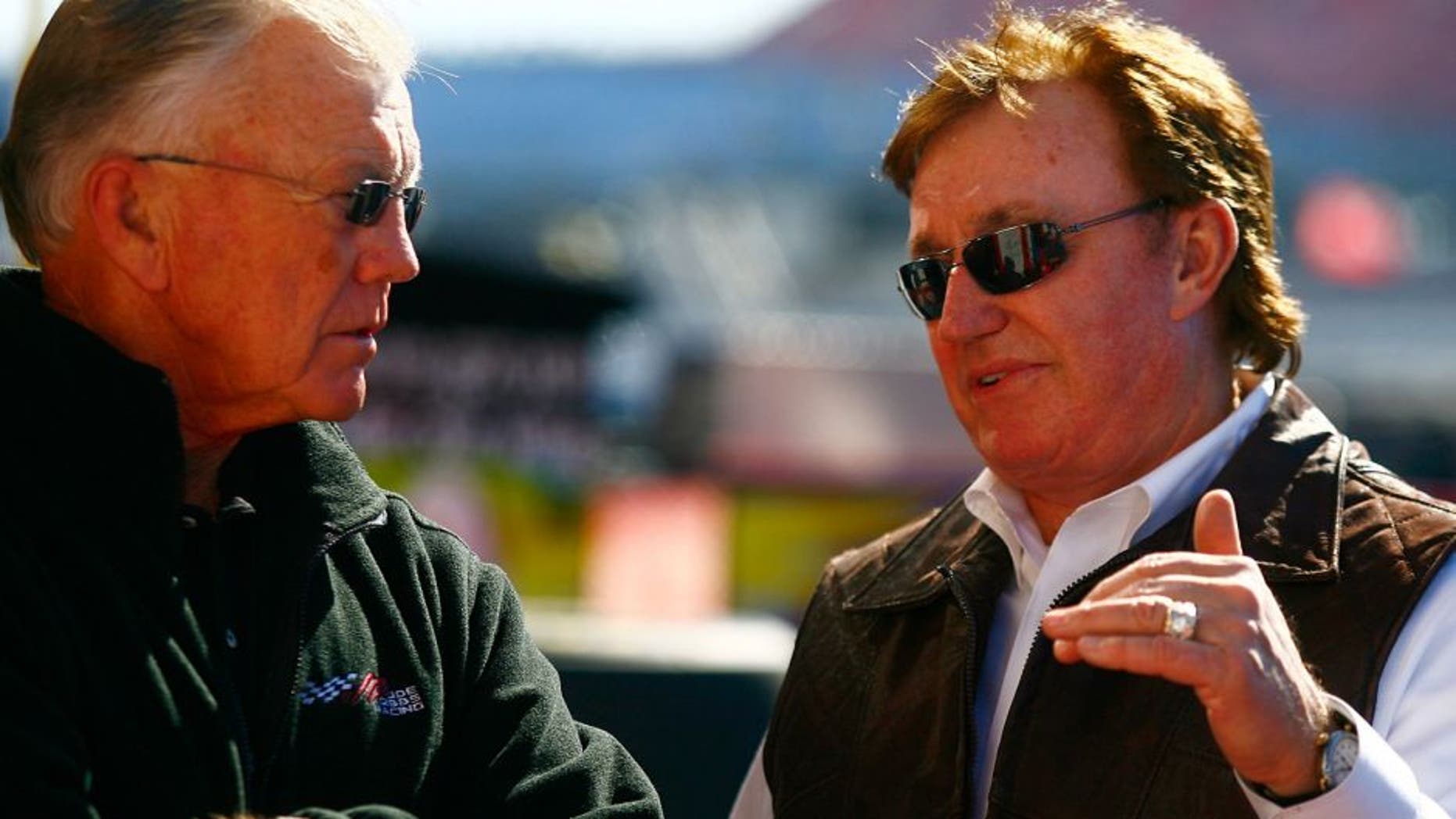 TALLADEGA, AL - OCTOBER 29: Team owners Joe Gibbs (L) and Richard Childress talk in the garage area during practice for the NASCAR Sprint Cup Series AMP Energy Juice 500 at Talladega Superspeedway on October 29, 2010 in Talladega, Alabama. (Photo by Jason Smith/Getty Images for NASCAR)