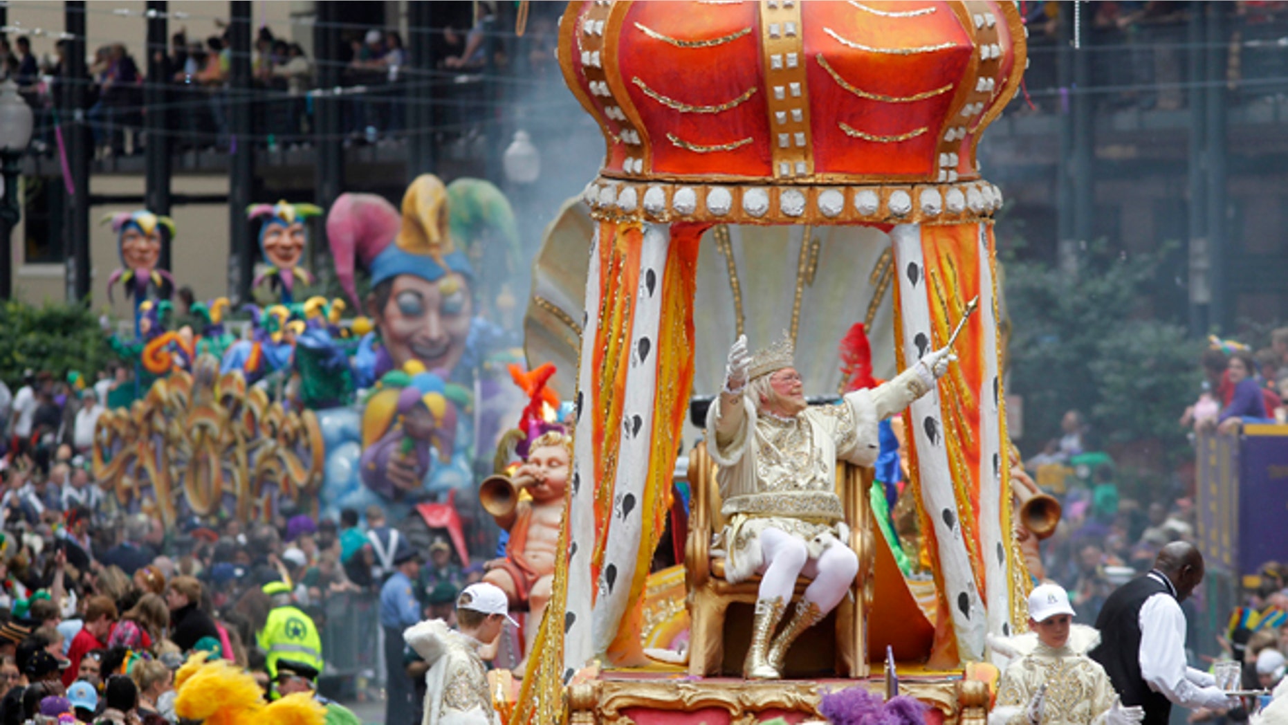 FILE - In this March 8, 2011 file photo, Rex, the King of Carnival rides in the Krewe of Rex as he arrives at Canal St. on Mardi Gras day in New Orleans.