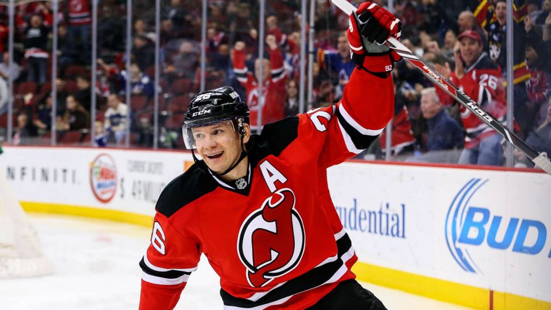 Feb 6, 2015; Newark, NJ, USA; New Jersey Devils left wing Patrik Elias (26) celebrates his 400th career NHL goal during the second period of their game against the Toronto Maple Leafs at Prudential Center. Mandatory Credit: Ed Mulholland-USA TODAY Sports