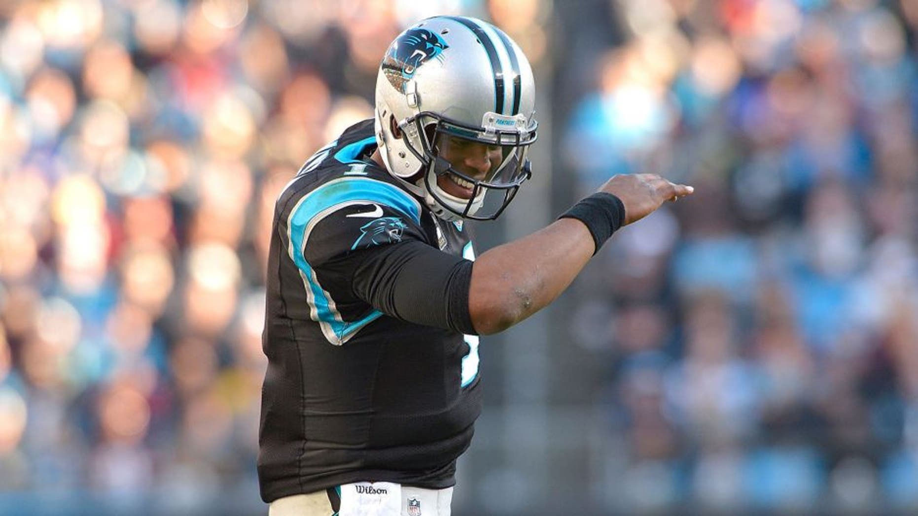 CHARLOTTE, NC - NOVEMBER 22: Cam Newton #1 of the Carolina Panthers does The Dab after a touchdown against the Washington Redskins during their game at Bank of America Stadium on November 22, 2015 in Charlotte, North Carolina. (Photo by Grant Halverson/Getty Images)