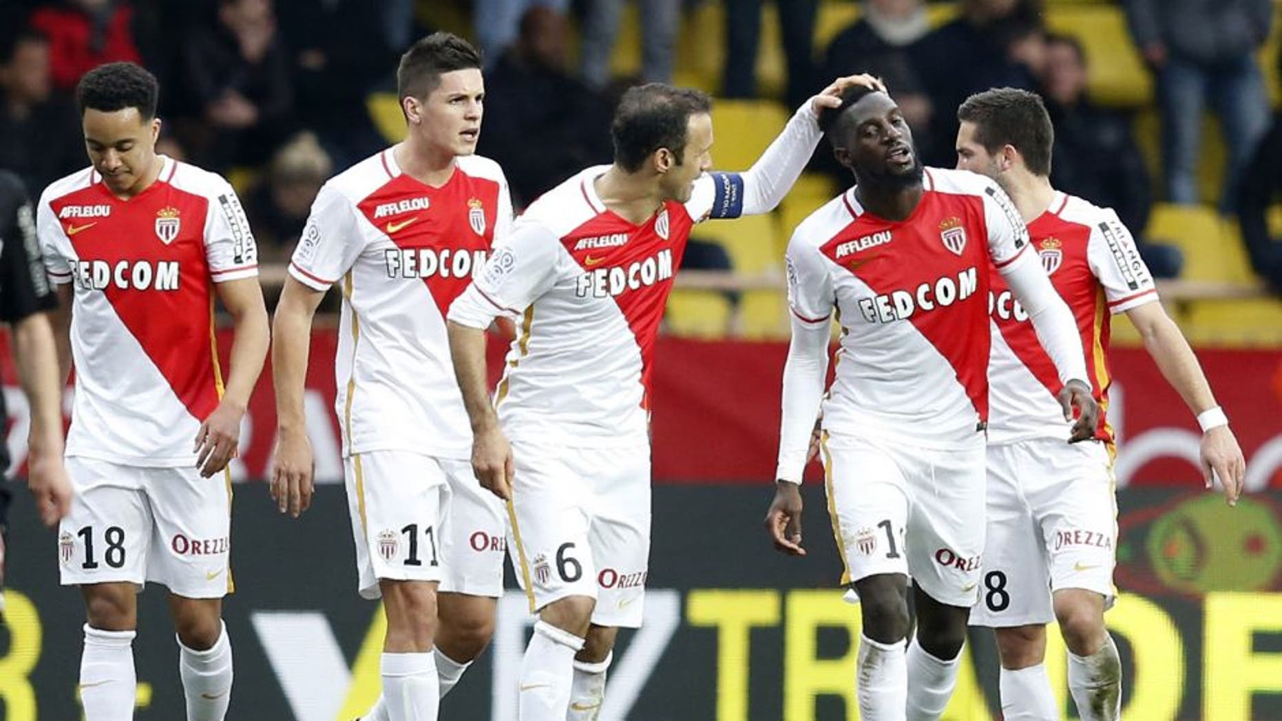 Monaco's French Midfielder Tiemoue Bakayoko (2nd R) celebrates with teammates after scoring a goal during the French L1 football match between Monaco (ASM) and Nice (OGCN) at Louis II Stadium in Monaco on February 6, 2016. AFP PHOTO / VALERY HACHE / AFP / VALERY HACHE (Photo credit should read VALERY HACHE/AFP/Getty Images)