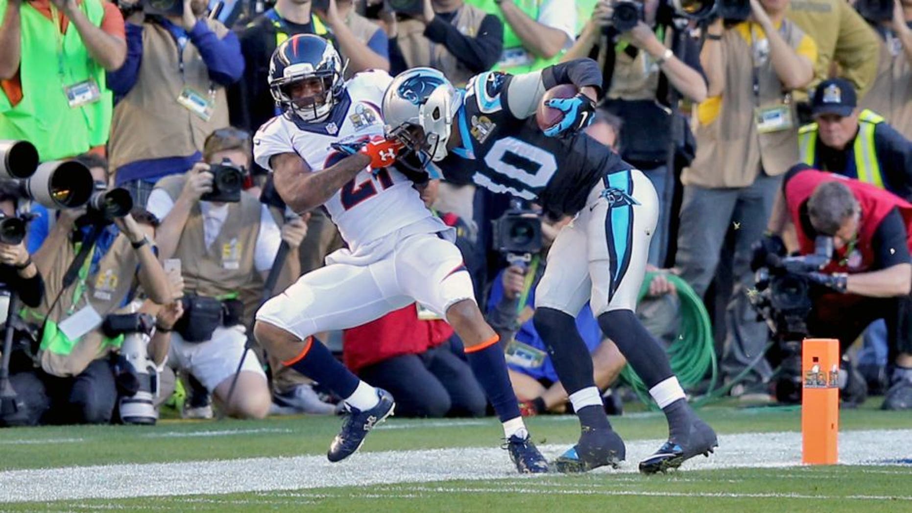 Feb 7, 2016; Santa Clara, CA, USA; Denver Broncos cornerback Aqib Talib (21) is called for a facemark penalty against Carolina Panthers wide receiver Corey Brown (10) during the second quarter in Super Bowl 50 at Levi's Stadium. Mandatory Credit: Kelley L Cox-USA TODAY Sports