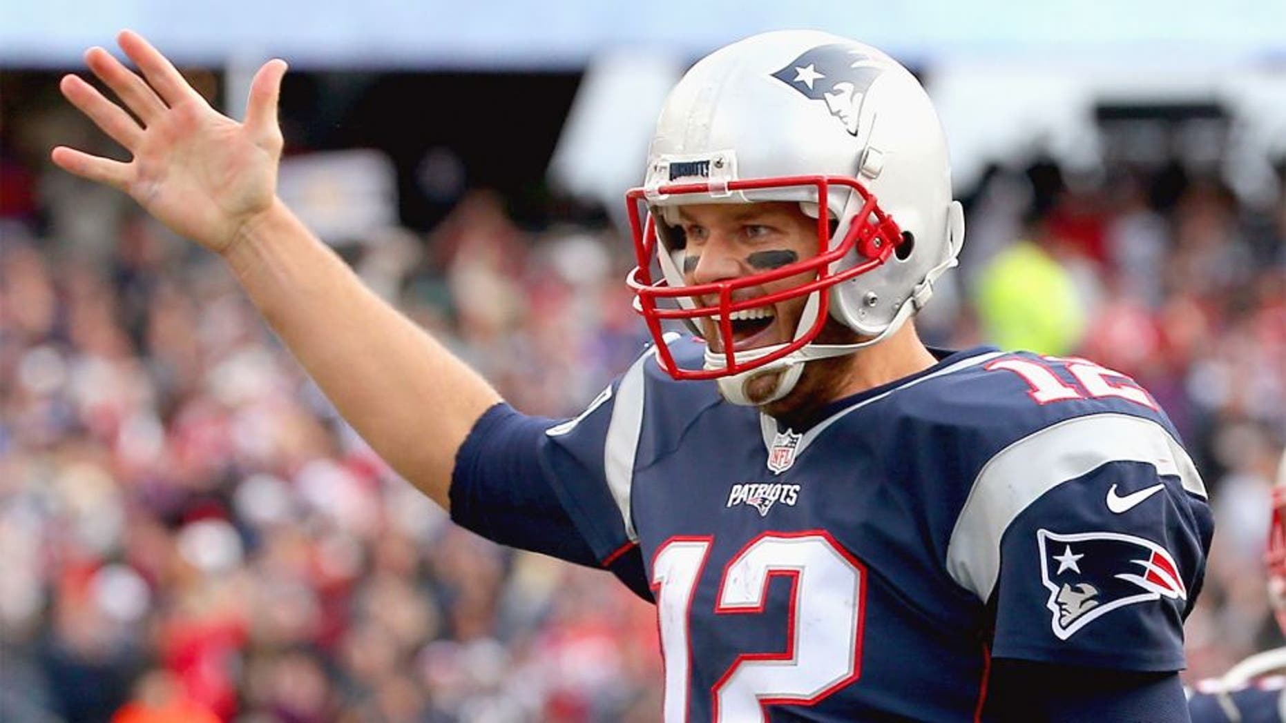 FOXBORO, MA - OCTOBER 25: Tom Brady #12 of the New England Patriots reacts after throwing a touchdown pass during the fourth quarter against the New York Jets at Gillette Stadium on October 25, 2015 in Foxboro, Massachusetts. (Photo by Jim Rogash/Getty Images)