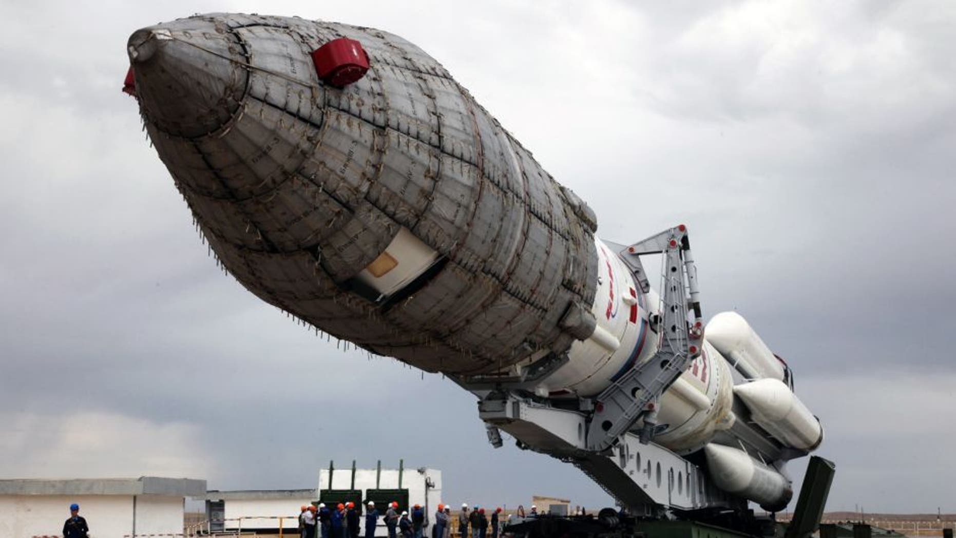 A Russian Proton-M rocket carrying the British telecommunications satellite Inmarsat-5 F3 is mounted on a launch pad at the Russian leased Baikonur cosmodrome on August 25, 2015. The launch of the rocket is scheduled on August 28. AFP PHOTO / STRINGER (Photo credit should read -/AFP/Getty Images)