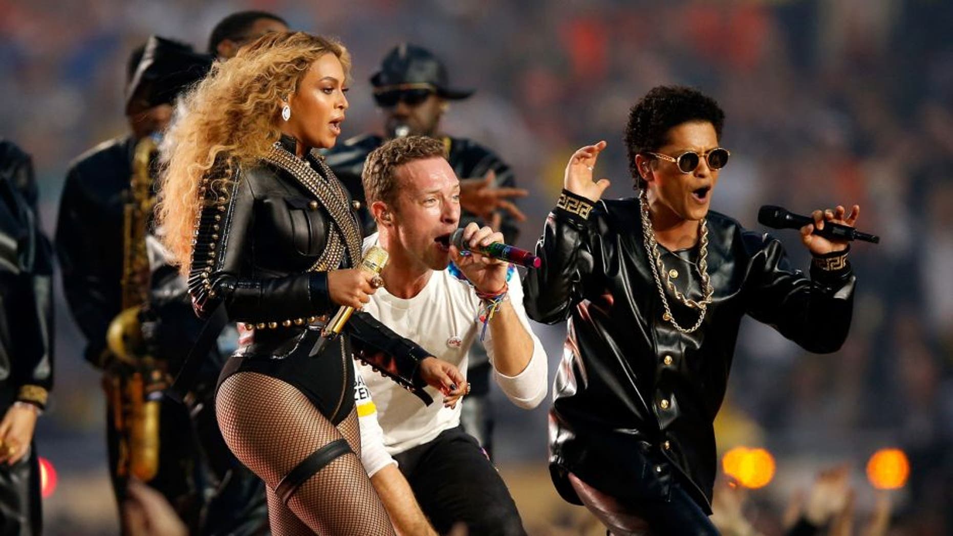 SANTA CLARA, CA - FEBRUARY 07: Beyonce, Chris Martin of Coldplay and Bruno Mars perform during the Pepsi Super Bowl 50 Halftime Show at Levi's Stadium on February 7, 2016 in Santa Clara, California. (Photo by Ezra Shaw/Getty Images)
