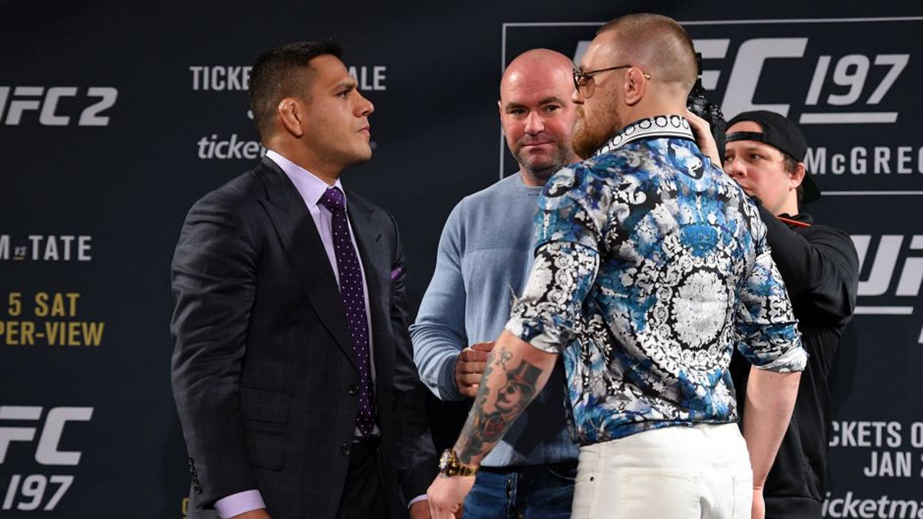 LAS VEGAS, NV - JANUARY 20: Rafael dos Anjos of Brazil (L) and Conor McGregor of Ireland (R) face off during the UFC 197 on-sale press conference event inside MGM Grand Hotel & Casino on January 20, 2016 in Las Vegas, Nevada. (Photo by Jeff Bottari/Zuffa LLC/Zuffa LLC via Getty Images)
