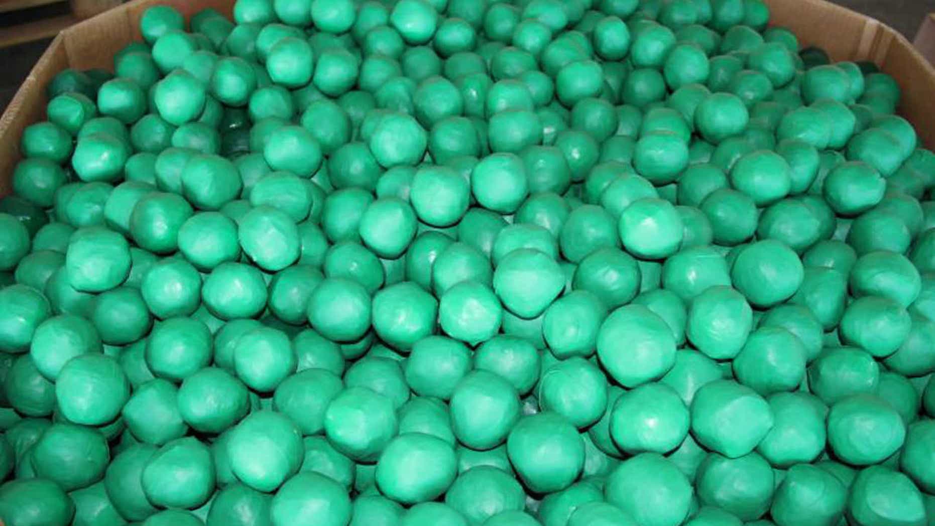 Lime-shaped bundles containing 3,947 pounds of marijuana seized by CBP officers at Pharr International Bridge