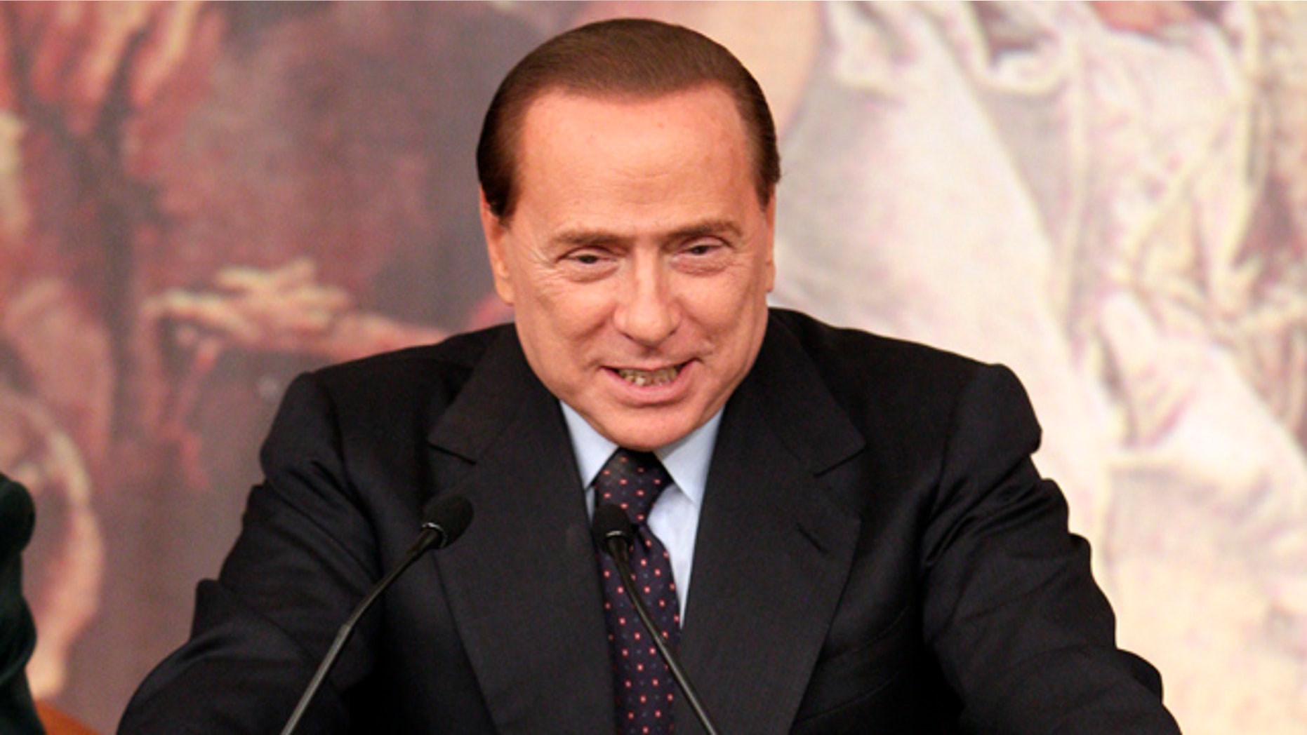 Feb. 9: Italian premier Silvio Berlusconi talks to journalists during a press conference following a cabinet meeting at Rome's Chigi palace.