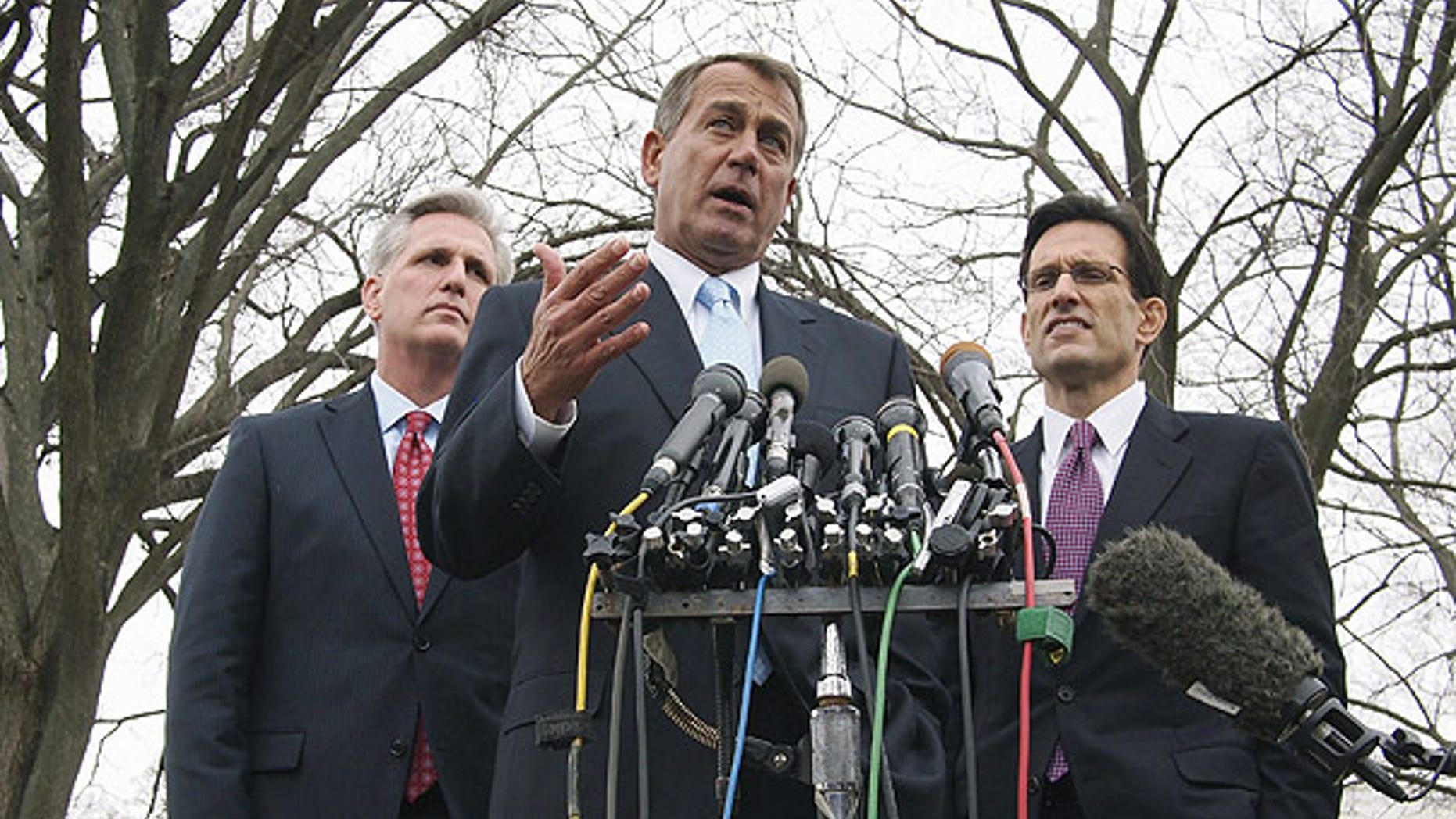 Feb. 9: House Speaker John Boehner, center, accompanied by House Majority Leader Eric Cantor, right, and House Majority Whip Kevin McCarthy outside the White House.