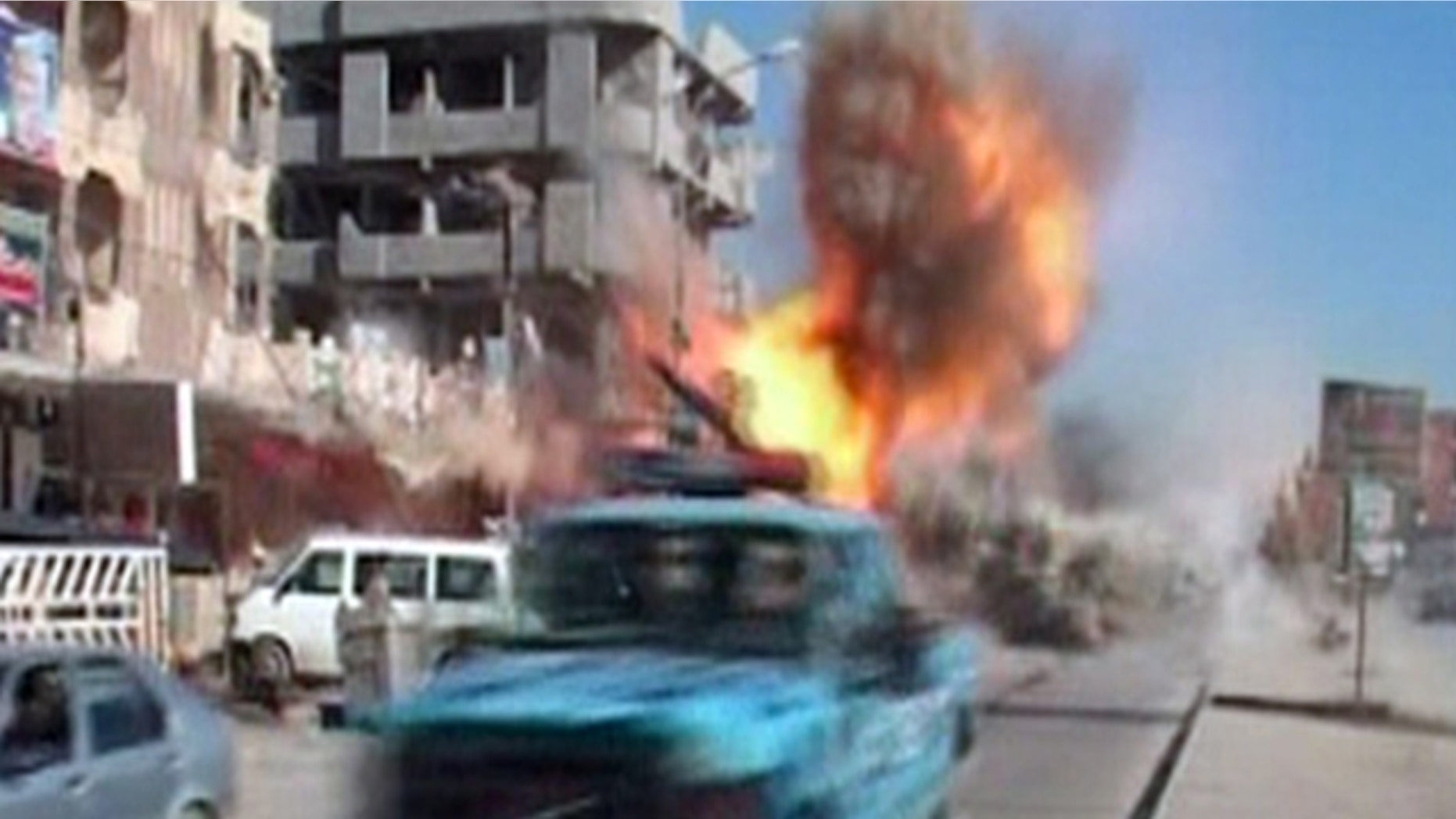Feb. 9: This image from TV shows the moment that a bomb detonates on a street in Kirkuk, Iraq, as security forces and emergency vehicles pass along the main road on their way to attend the scene of another explosion.