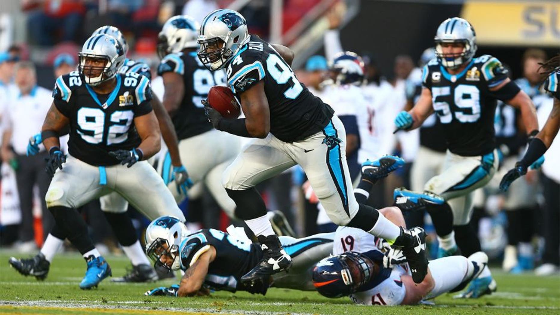 Feb 7, 2016; Santa Clara, CA, USA; Carolina Panthers defensive end Kony Ealy (94) returns an interception against the Denver Broncos in the second quarter in Super Bowl 50 at Levi's Stadium. Mandatory Credit: Mark J. Rebilas-USA TODAY Sports