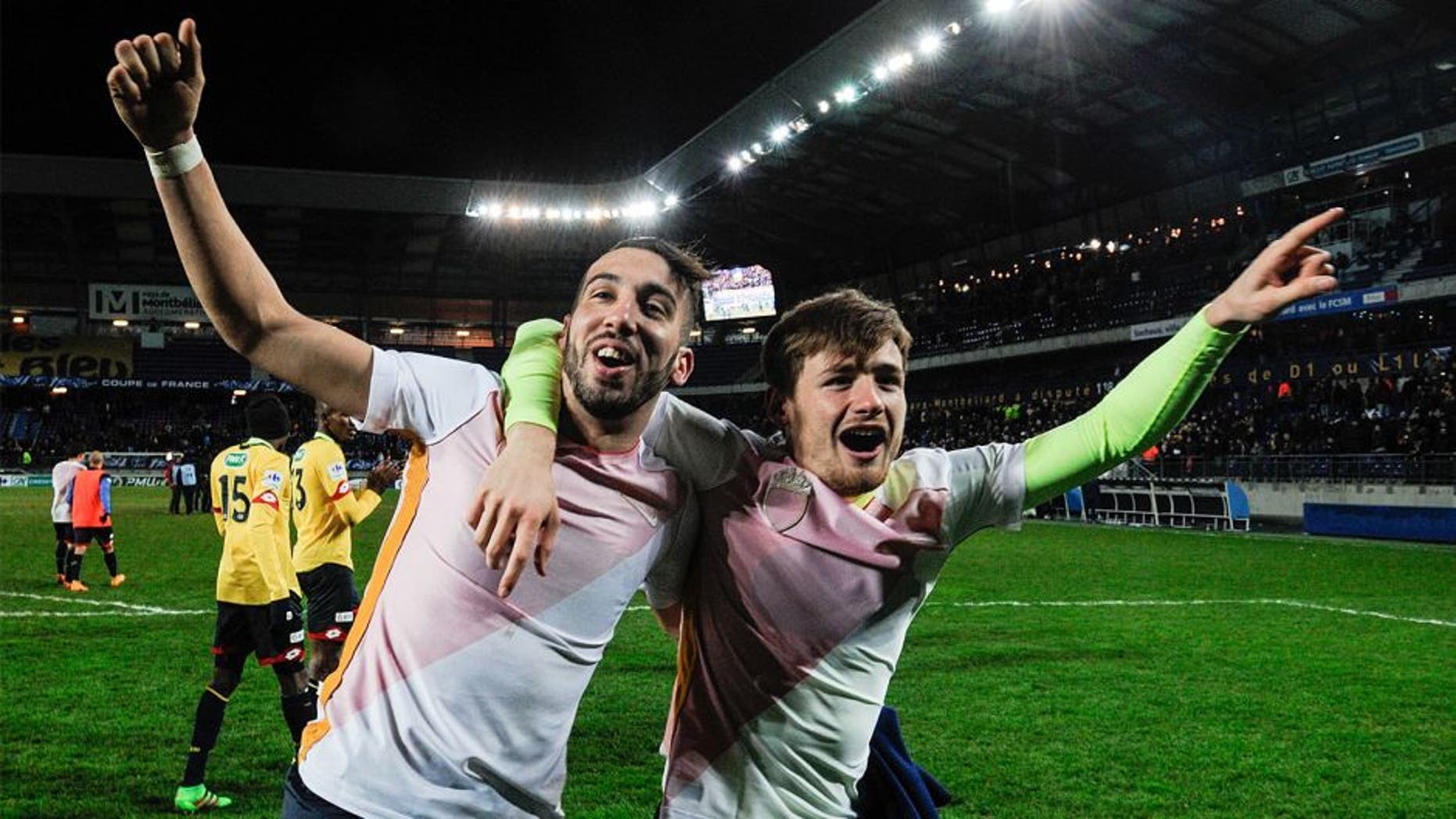 Sochaux' French midfielder Florian Tardieu (L) and Sochaux' French forward Thomas Robinet (R), jubilate at the end of the French cup round of 8 football match between Sochaux (FCSM) and Monaco (ASM) at the Auguste Bonal Stadium in Montbeliard, on February 9, 2016. / AFP / SEBASTIEN BOZON (Photo credit should read SEBASTIEN BOZON/AFP/Getty Images)