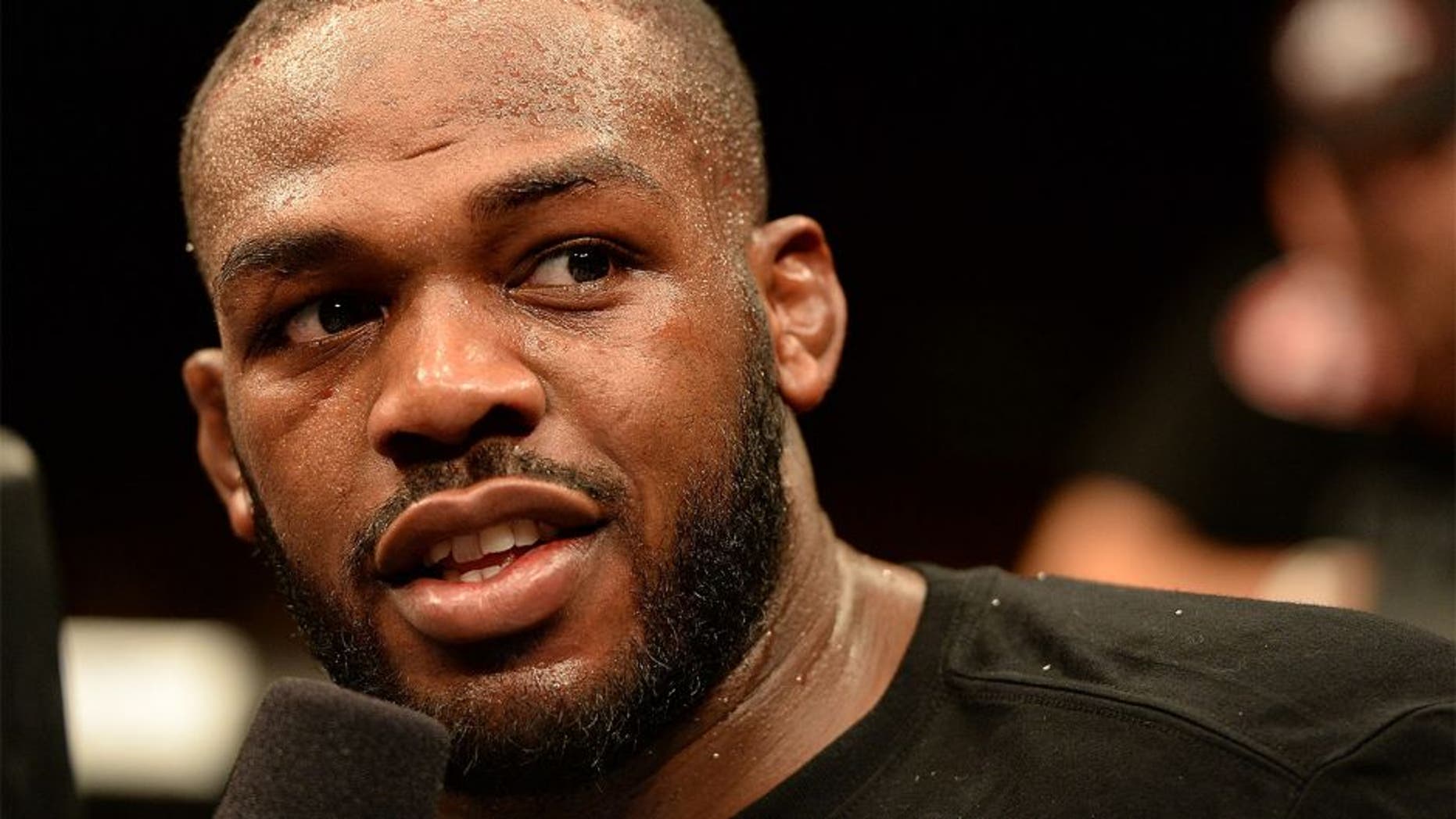 BALTIMORE, MD - APRIL 26: Jon "Bones" Jones is interviewed after defeating Glover Teixeira in their light heavyweight championship bout during the UFC 172 event at the Baltimore Arena on April 26, 2014 in Baltimore, Maryland. (Photo by Patrick Smith/Zuffa LLC/Zuffa LLC via Getty Images)