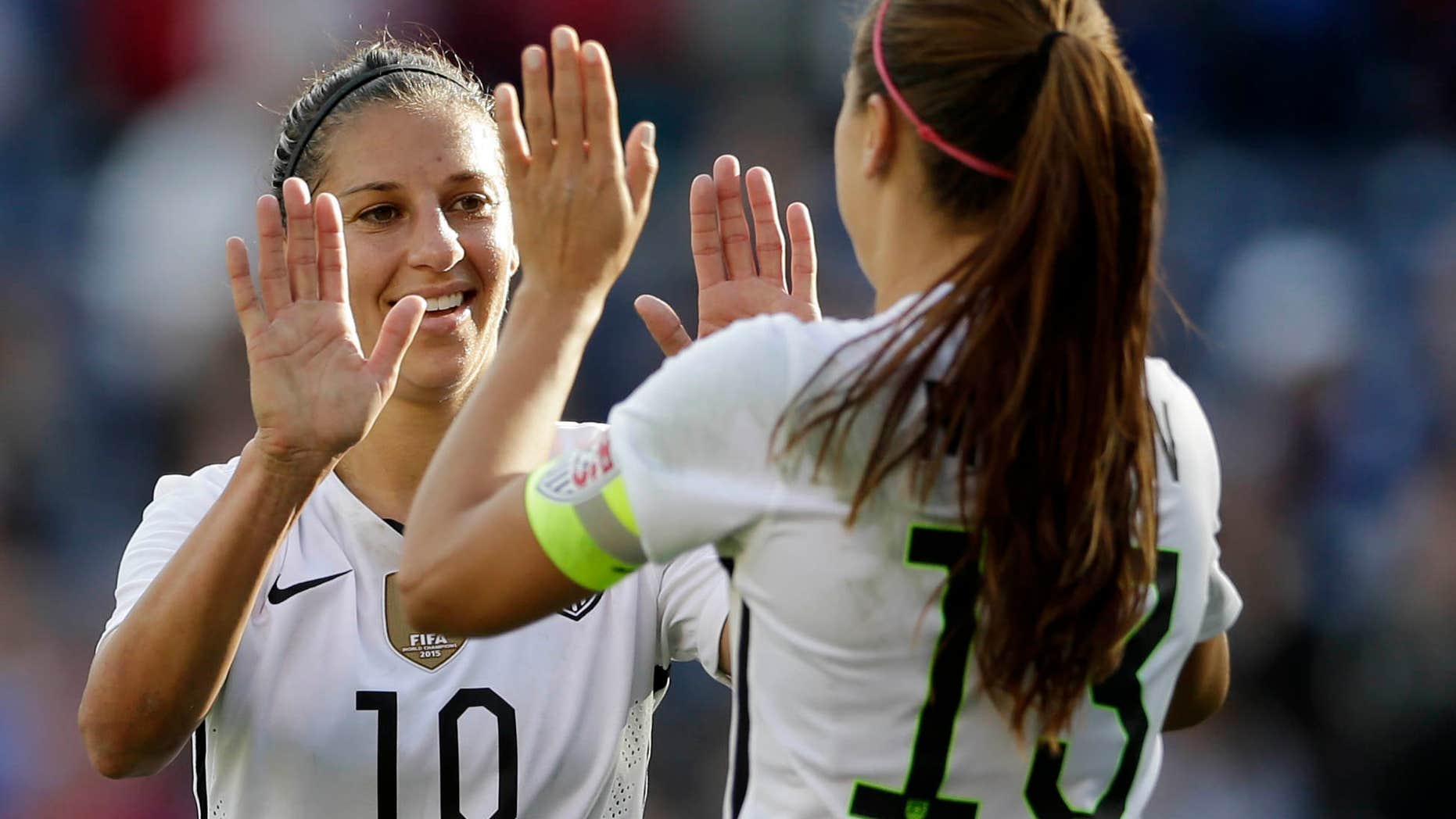 Jan. 23, 2016: he United States' Carli Lloyd (10) celebrates a goal with teammate Alex Morgan, right, during the first half in a women's international friendly soccer game against Ireland.