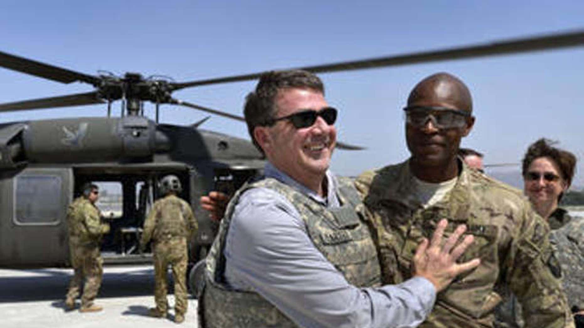 Former Defense Secretary Ash Carter with Maj. Gen. Ronald Lewis