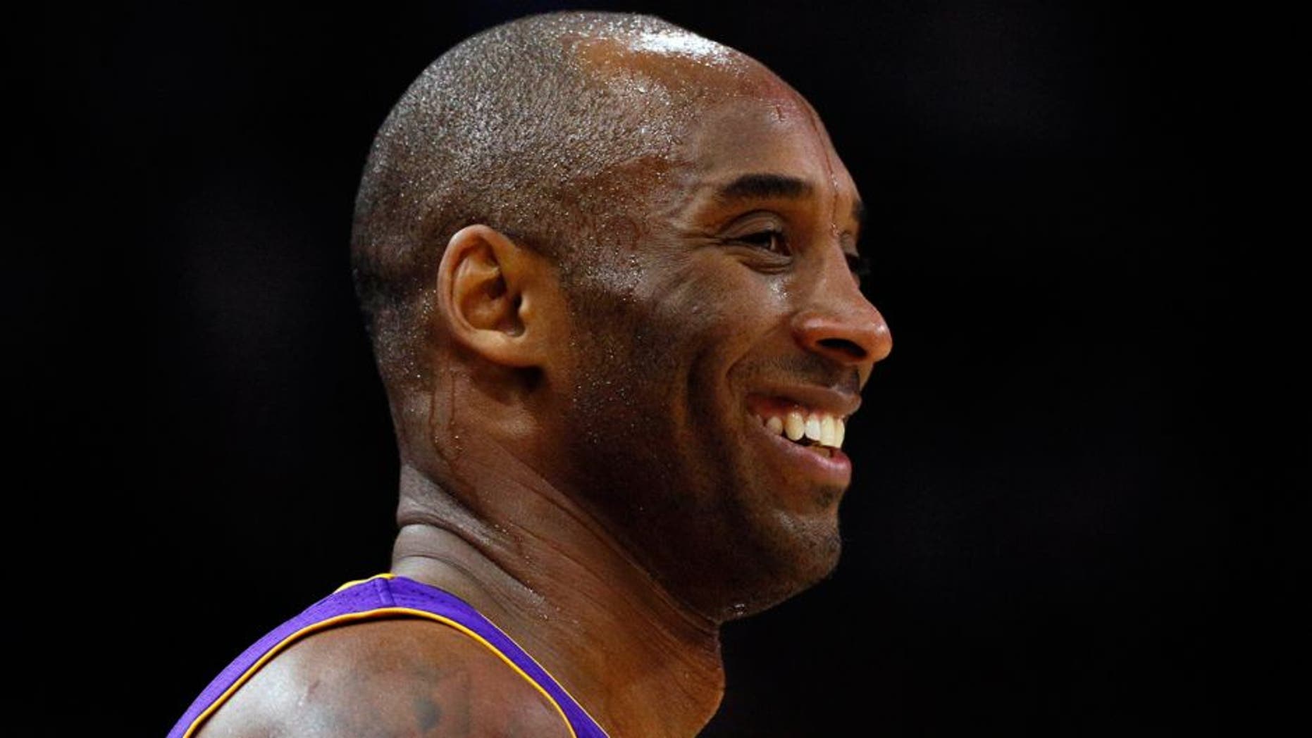 Feb 6, 2016; San Antonio, TX, USA; Los Angeles Lakers small forward Kobe Bryant (24) smiles during the first half against the San Antonio Spurs at AT&T Center. Mandatory Credit: Soobum Im-USA TODAY Sports