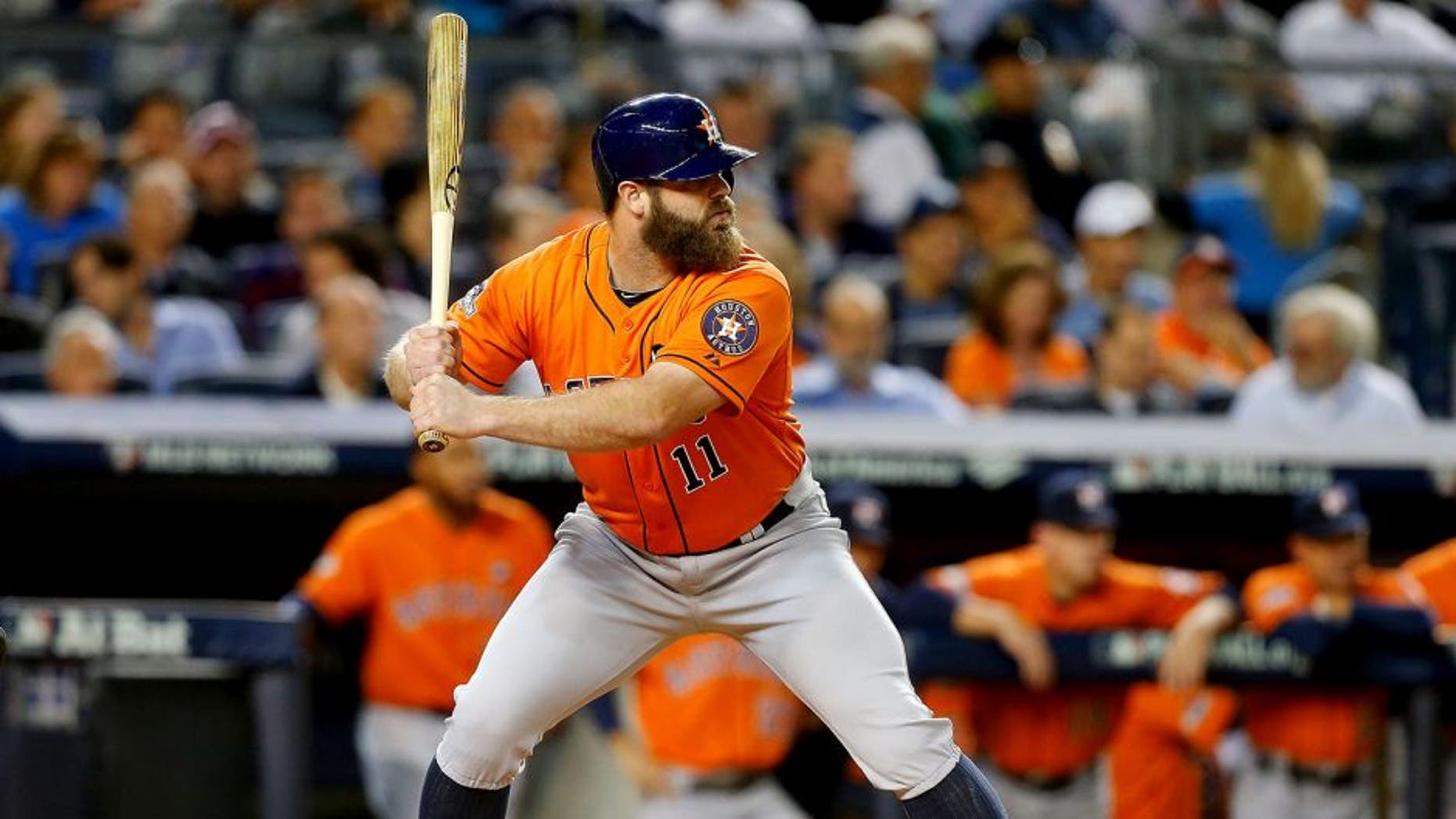 NEW YORK, NY - OCTOBER 06: (NEW YORK DAILIES OUT) Evan Gattis #11 of the Houston Astros in action against the New York Yankees during the American League Wild Card Game at Yankee Stadium on October 6, 2015 in the Bronx borough of New York City, New York. The Astros defeated the Yankees 3-0. (Photo by Jim McIsaac/Getty Images)