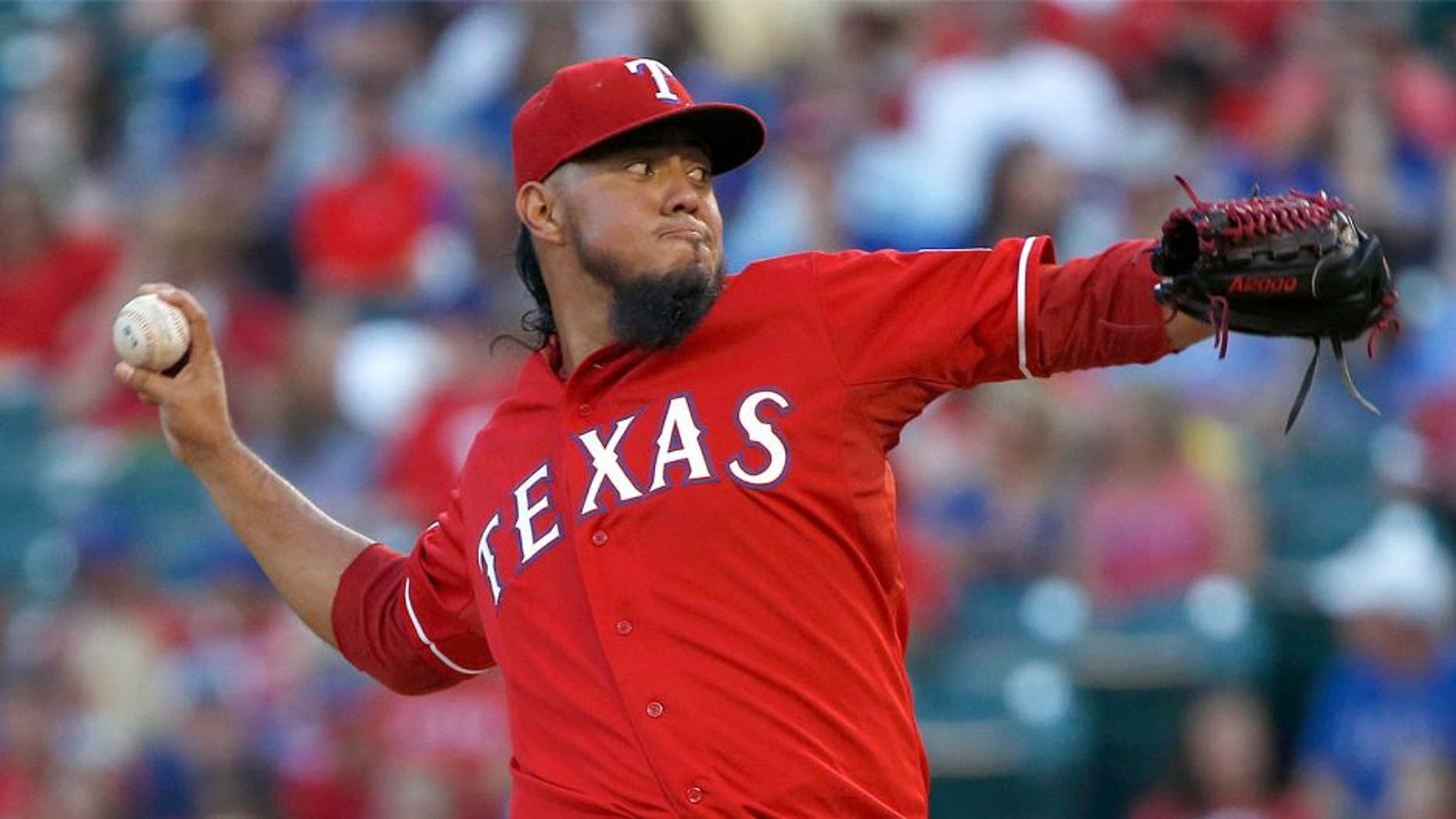 ARLINGTON, TX - SEPTEMBER 12: Yovani Gallardo #49 of the Texas Rangers pitches against the Oakland Athletics in the top of the first inning at Globe Life Park in Arlington on September 12, 2015 in Arlington, Texas. (Photo by Ron Jenkins/Getty Images)