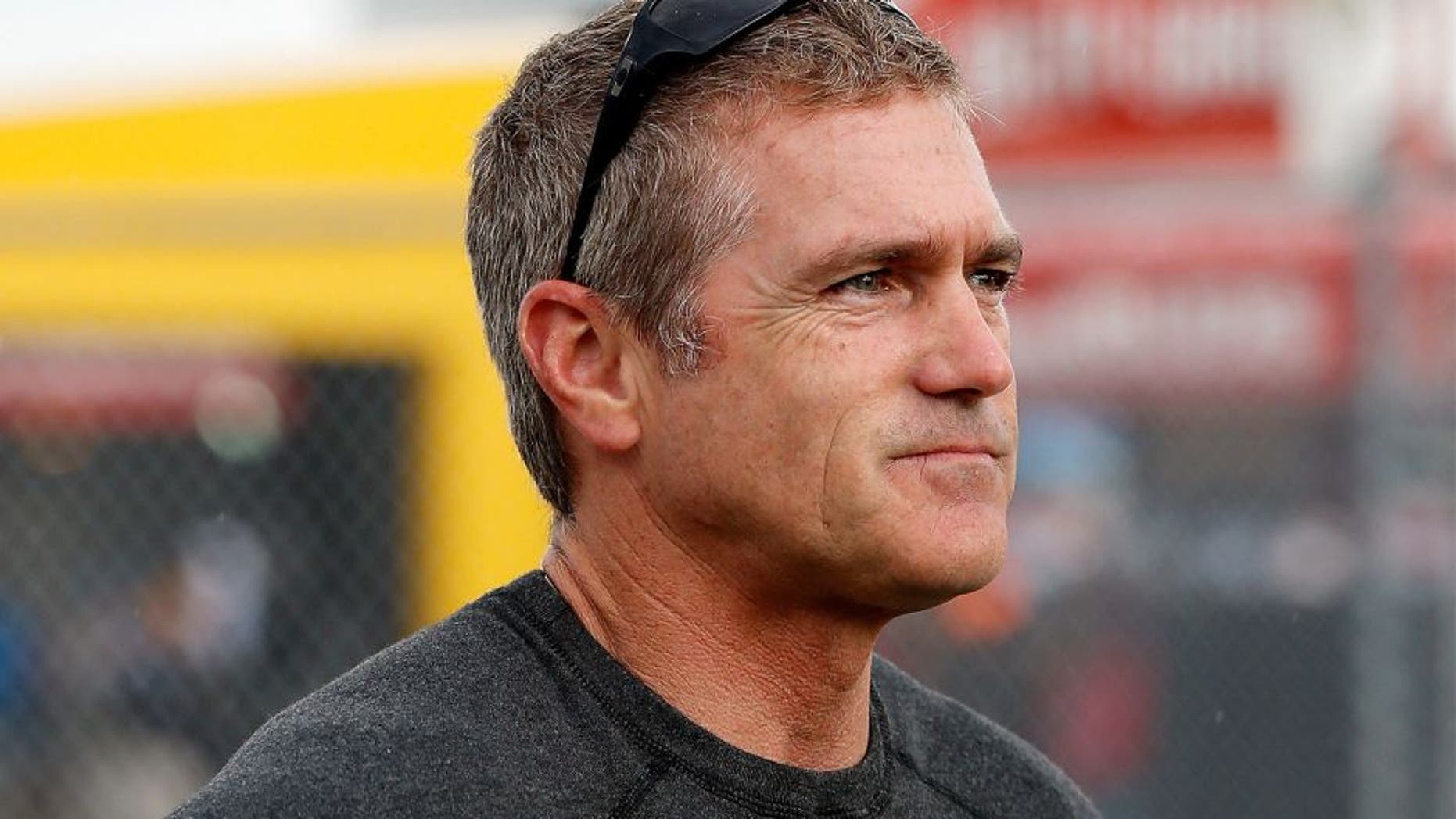 DAYTONA BEACH, FL - JULY 04: Bobby Labonte, driver of the #33 Thunder Coal Chevrolet, stands on the grid during qualifying for the NASCAR Sprint Cup Series Coke Zero 400 at Daytona International Speedway on July 4, 2014 in Daytona Beach, Florida. (Photo by Scott Halleran/Getty Images)