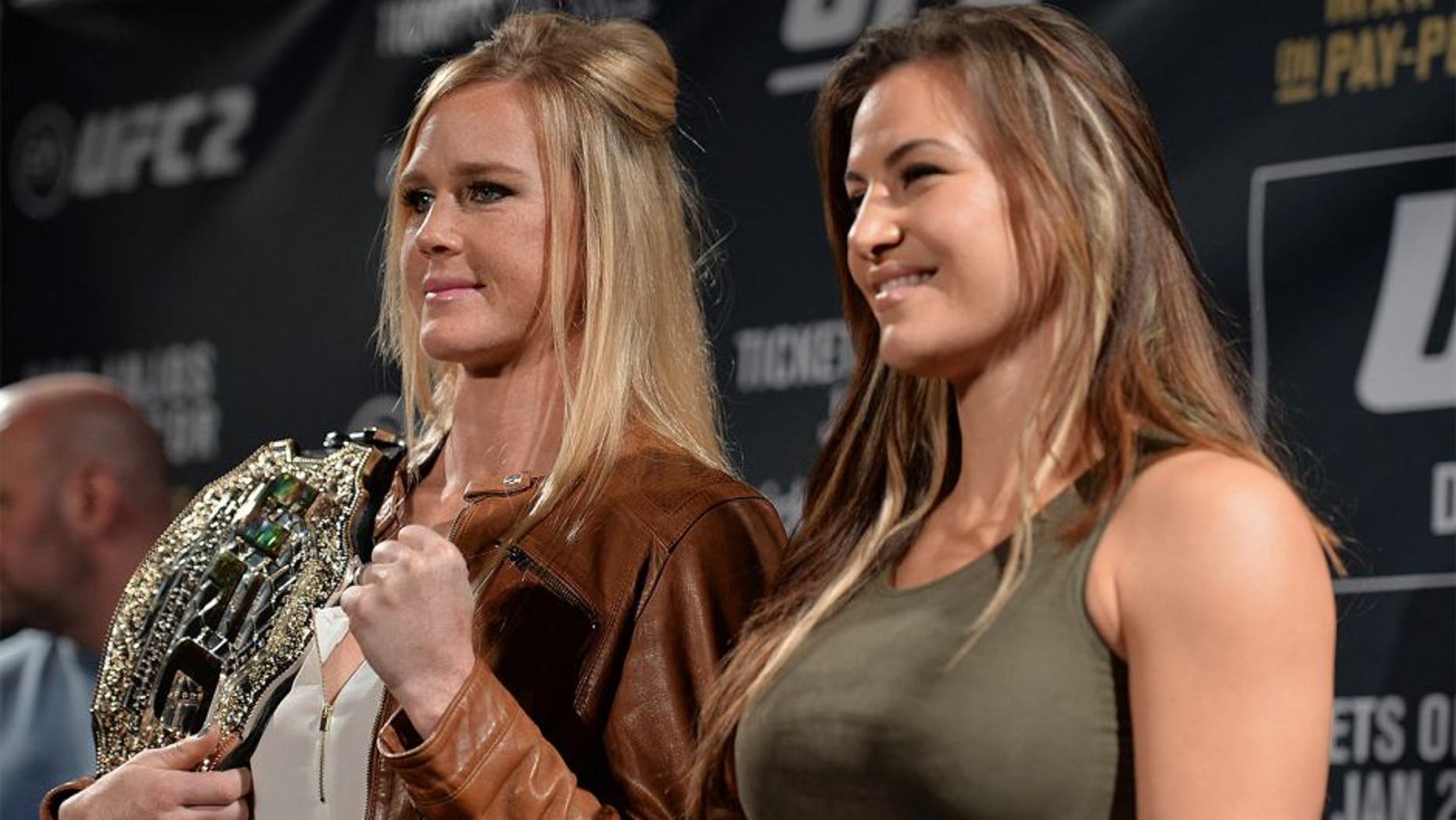 LAS VEGAS, NV - JANUARY 20: (L-R) UFC bantamweight champion Holly Holm and Miesha Tate pose for a picture during the UFC 197 on-sale press conference event inside MGM Grand Hotel & Casino on January 20, 2016 in Las Vegas, Nevada. (Photo by Brandon Magnus/Zuffa LLC/Zuffa LLC via Getty Images)