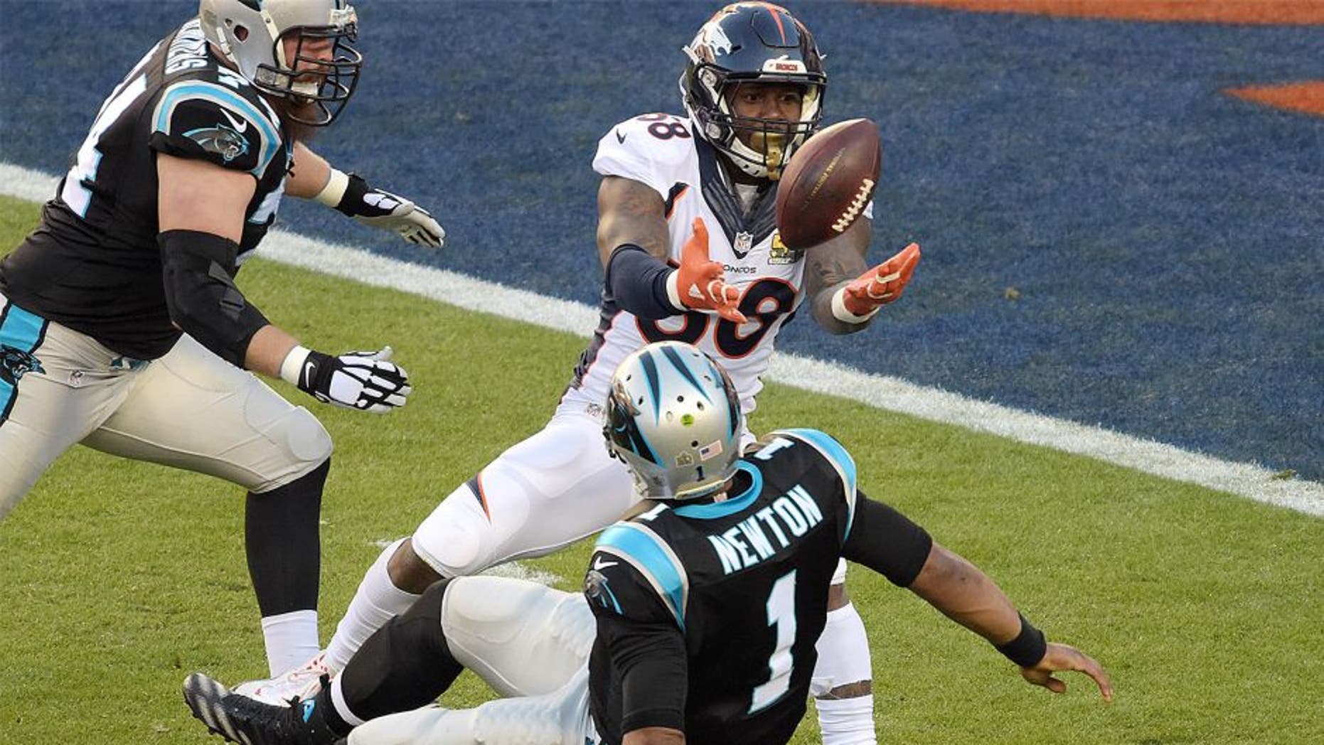 Feb 7, 2016; Santa Clara, CA, USA; Denver Broncos outside linebacker Von Miller (58) strips the ball from Carolina Panthers quarterback Cam Newton (1) in Super Bowl 50 at Levi's Stadium. Mandatory Credit: Kirby Lee-USA TODAY Sports