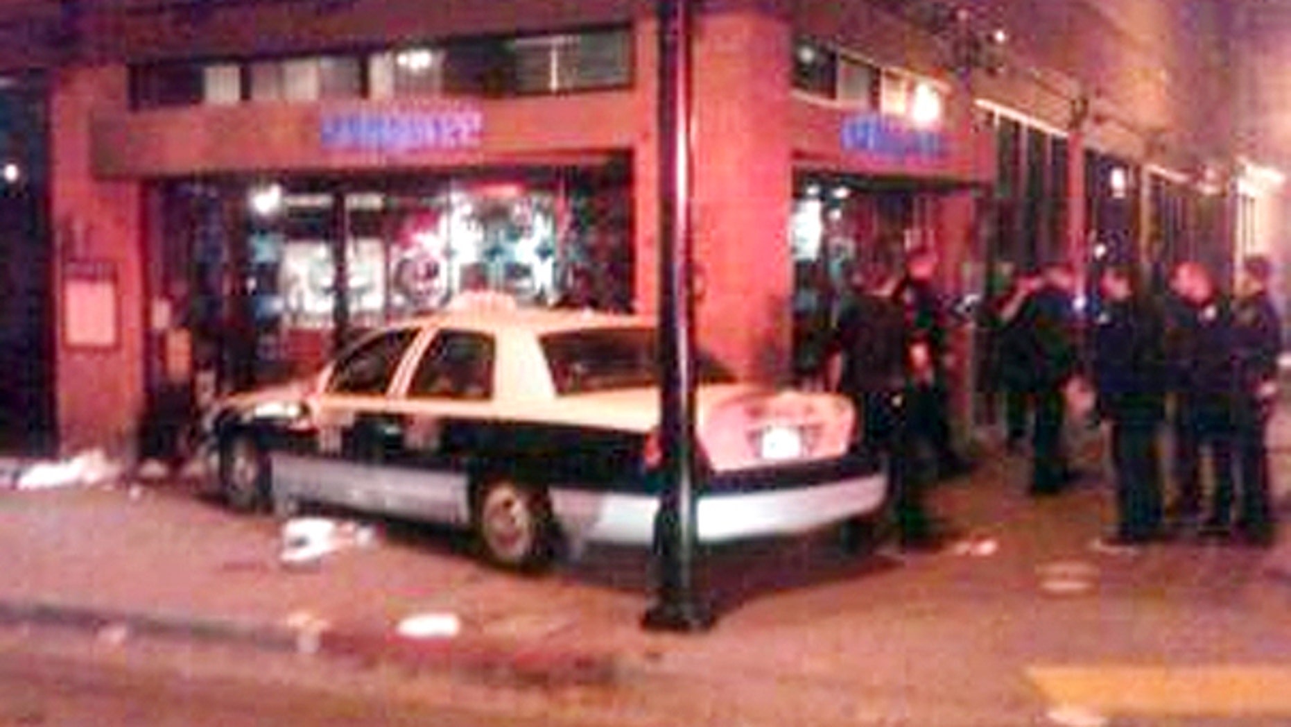 Feb. 12: This image provided by the San Diego Fire and Rescue Department shows the scene where according to police, a taxi cab driver plowed slowly into a crowd on a sidewalk in San Diego's busy Gaslamp District, injuring more than two dozen people.