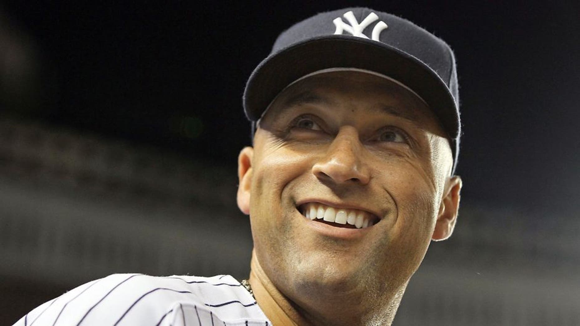 NEW YORK, NY - APRIL 19: (NEW YORK DAILIES OUT) Derek Jeter #2 of the New York Yankees looks on against the Minnesota Twins at Yankee Stadium on April 19, 2012 in the Bronx borough of New York City. The Yankees defeated the Twins 7-6. (Photo by Jim McIsaac/Getty Images)