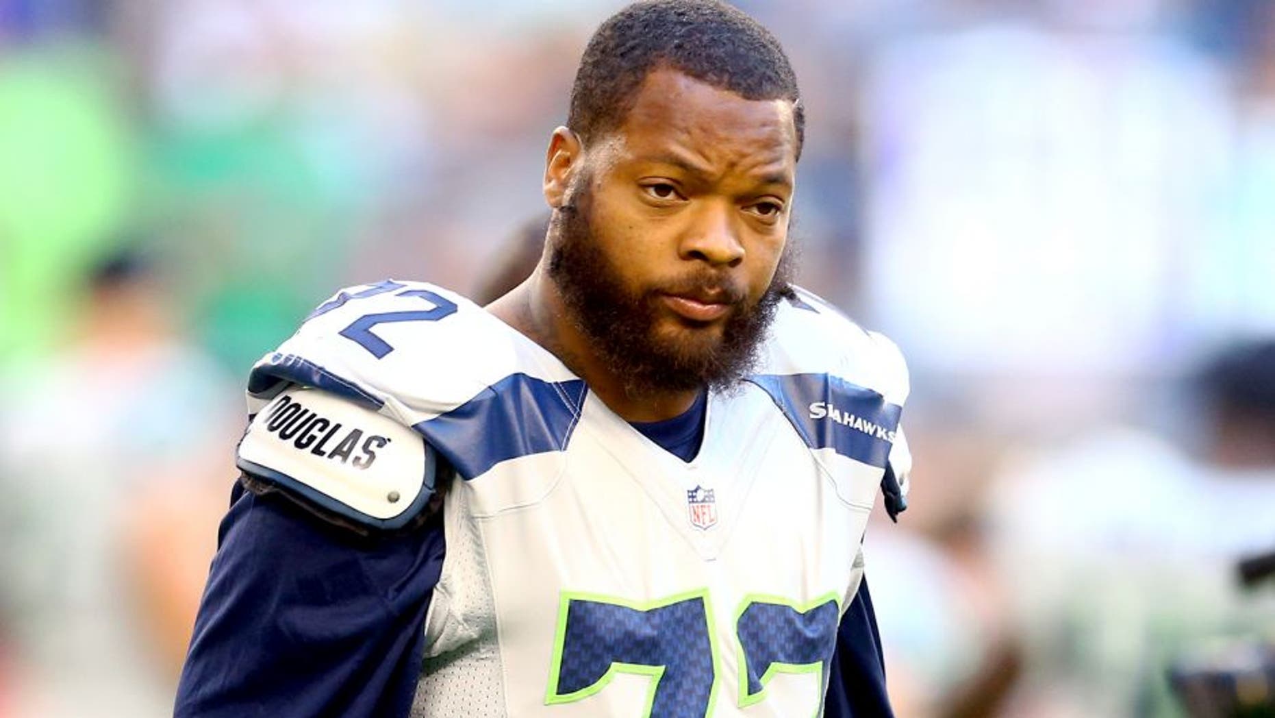 Oct 17, 2013; Phoenix, AZ, USA; Seattle Seahawks defensive end Michael Bennett against the Arizona Cardinals at University of Phoenix Stadium. Mandatory Credit: Mark J. Rebilas-USA TODAY Sports