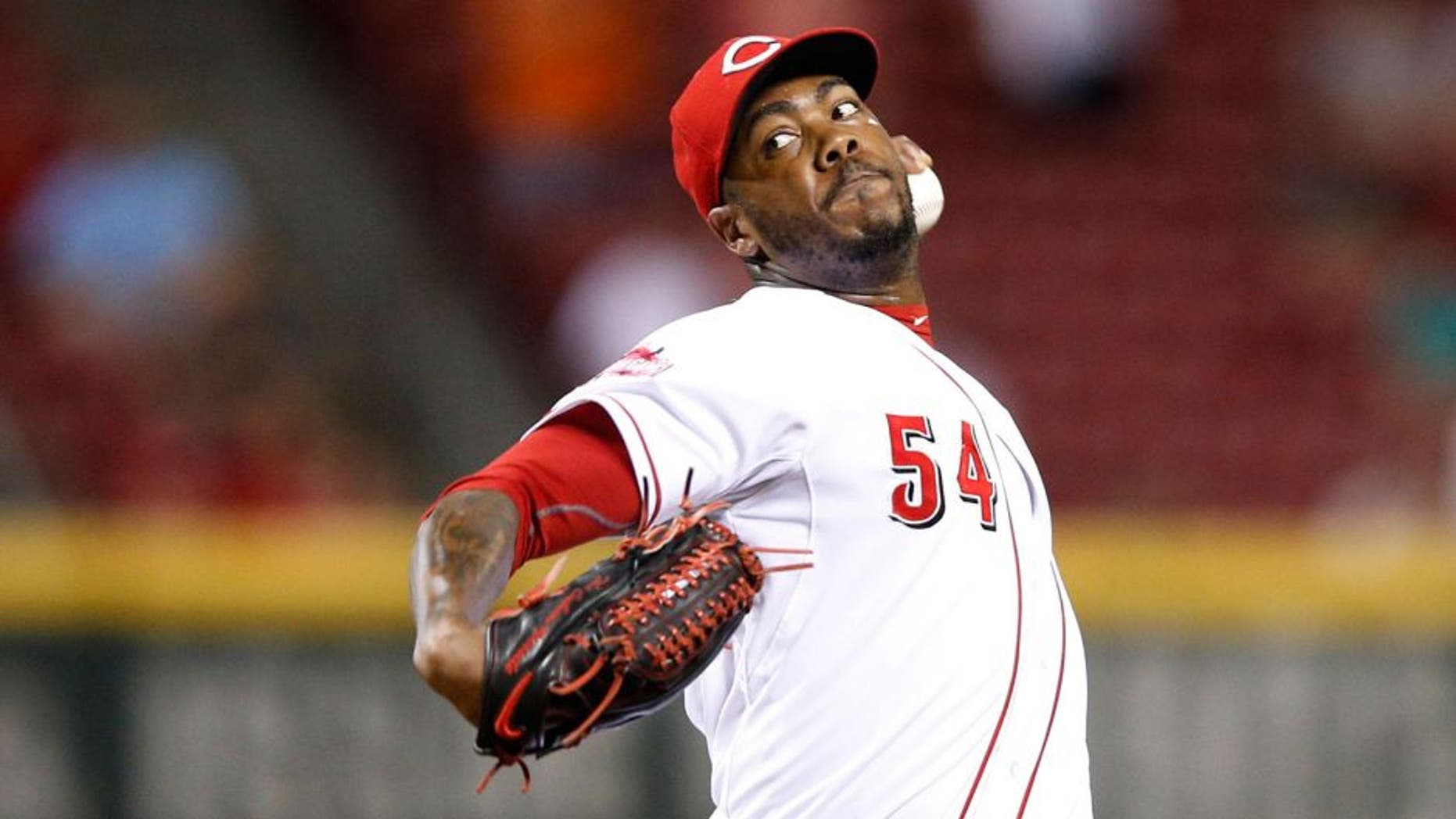 CINCINNATI, OH - AUGUST 24: Aroldis Chapman #54 of the Cincinnati Reds pitches in the ninth inning against the Detroit Tigers at Great American Ball Park on August 24, 2015 in Cincinnati, Ohio. The Reds defeated the Tigers 12-5. (Photo by Joe Robbins/Getty Images)