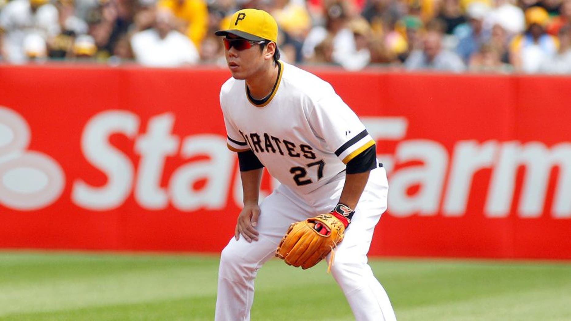 PITTSBURGH, PA - JULY 26: Jung Ho Kang #27 of the Pittsburgh Pirates plays the field during the game against the Washington Nationals at PNC Park on July 26, 2015 in Pittsburgh, Pennsylvania. (Photo by Justin K. Aller/Getty Images)