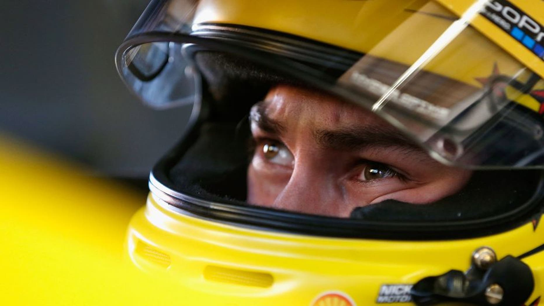 DAYTONA BEACH, FL - FEBRUARY 12: Joey Logano, driver of the #22 Shell Pennzoil Ford, sits in his car during practice for the NASCAR Sprint Cup Series Sprint Unlimited at Daytona International Speedway on February 12, 2016 in Daytona Beach, Florida. (Photo by Brian Lawdermilk/Getty Images)