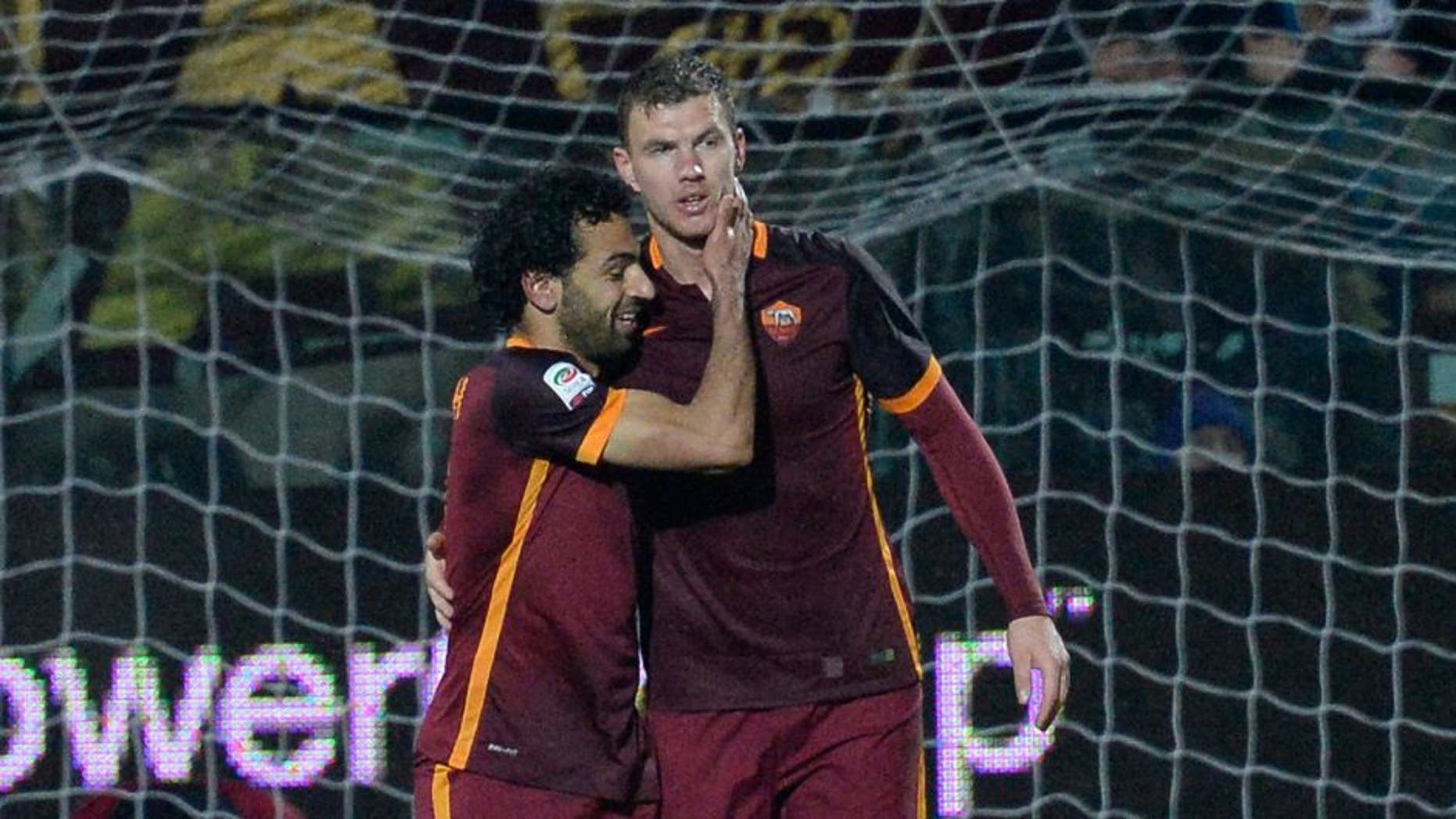 MODENA, ITALY - FEBRUARY 12: Edin Dzeko of AS Roma celebrate after scoring his team's second goal during the Serie A match between Carpi FC and AS Roma at Alberto Braglia Stadium on February 12, 2016 in Modena, Italy. (Photo by Dino Panato/Getty Images)
