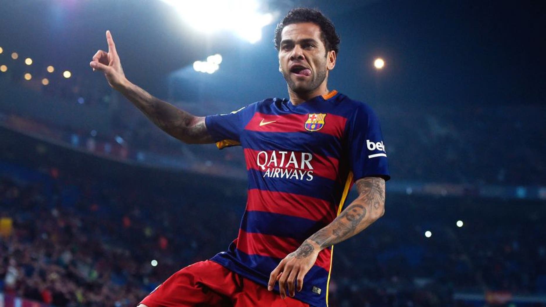 BARCELONA, SPAIN - DECEMBER 02: Dani Alves of FC Barcelona celebrates after scoring the opening goal during the Copa del Rey Round of 32 second leg match betwen FC Barcelona and Villanovense on December 2, 2015 in Barcelona, Spain. (Photo by David Ramos/Getty Images)