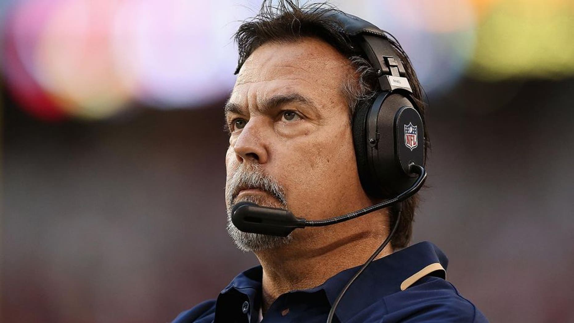 GLENDALE, AZ - DECEMBER 08: Head coach Jeff Fisher of the St. Louis Rams reacts on the sidelines during the NFL game against the Arizona Cardinals at the University of Phoenix Stadium on December 8, 2013 in Glendale, Arizona. (Photo by Christian Petersen/Getty Images)