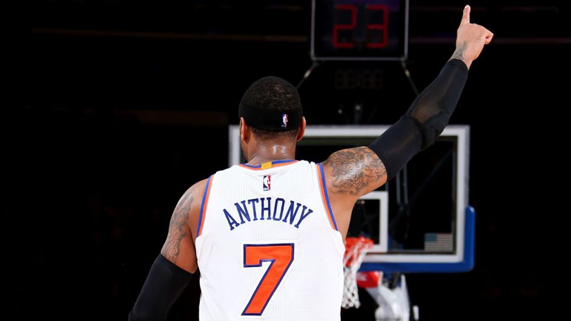 NEW YORK, NY - FEBRUARY 9: Carmelo Anthony #7 of the New York Knicks reacts to a play against the Washington Wizards on February 9, 2016 at Madison Square Garden in New York City, New York. NOTE TO USER: User expressly acknowledges and agrees that, by downloading and or using this photograph, User is consenting to the terms and conditions of the Getty Images License Agreement. Mandatory Copyright Notice: Copyright 2016 NBAE (Photo by Nathaniel S. Butler/NBAE via Getty Images)